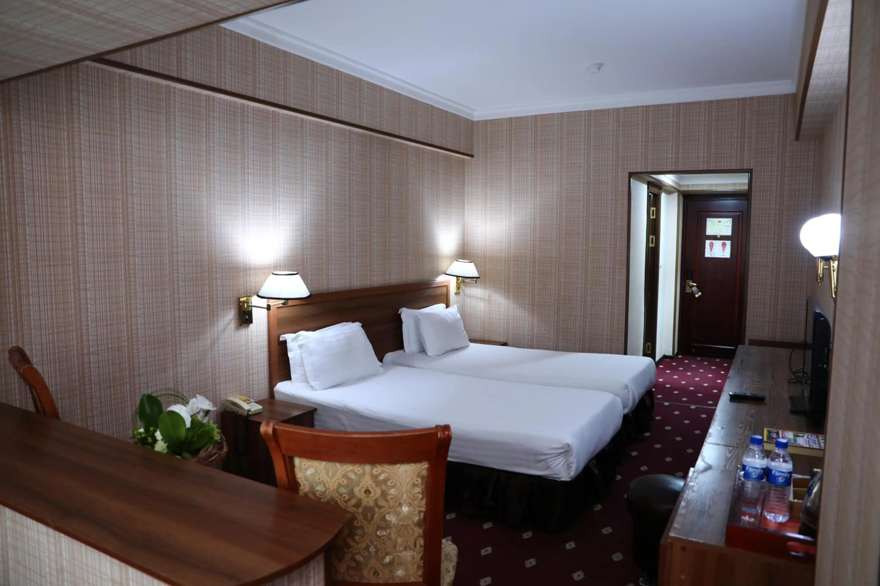 Bed in Le Grande Plaza Hotel