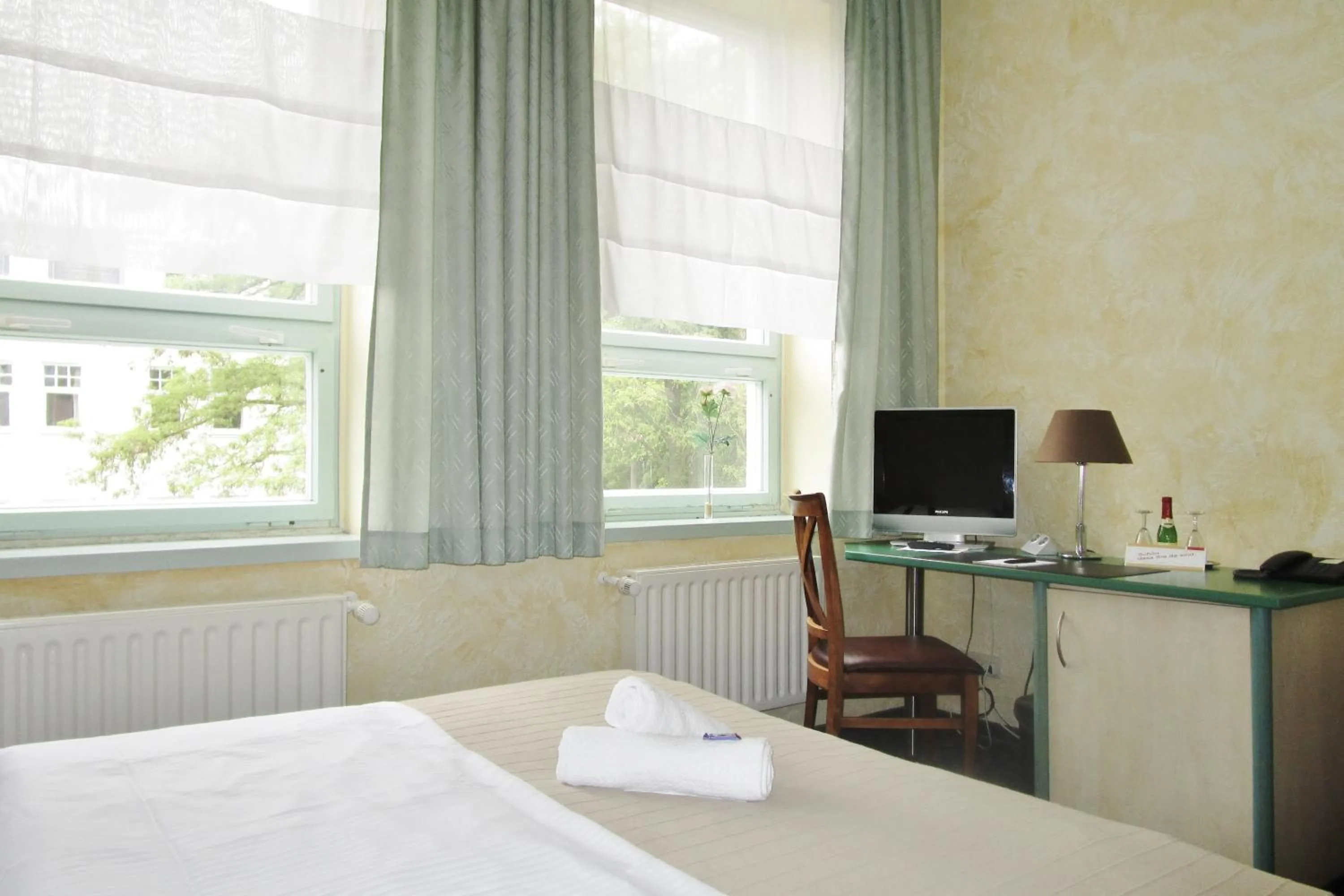 Photo of the whole room, Bed in Hotel Ostseestern