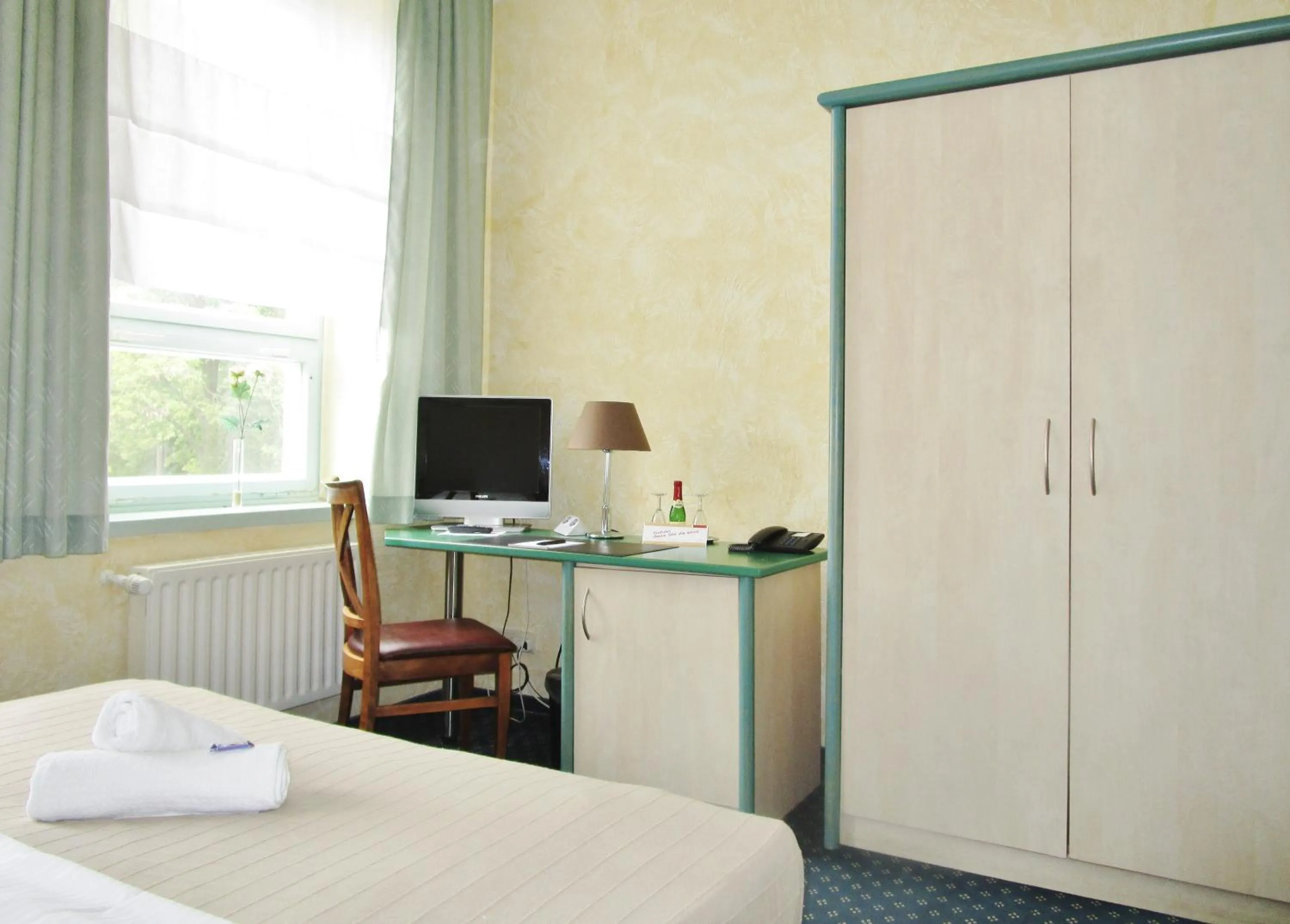 Photo of the whole room, Bed in Hotel Ostseestern