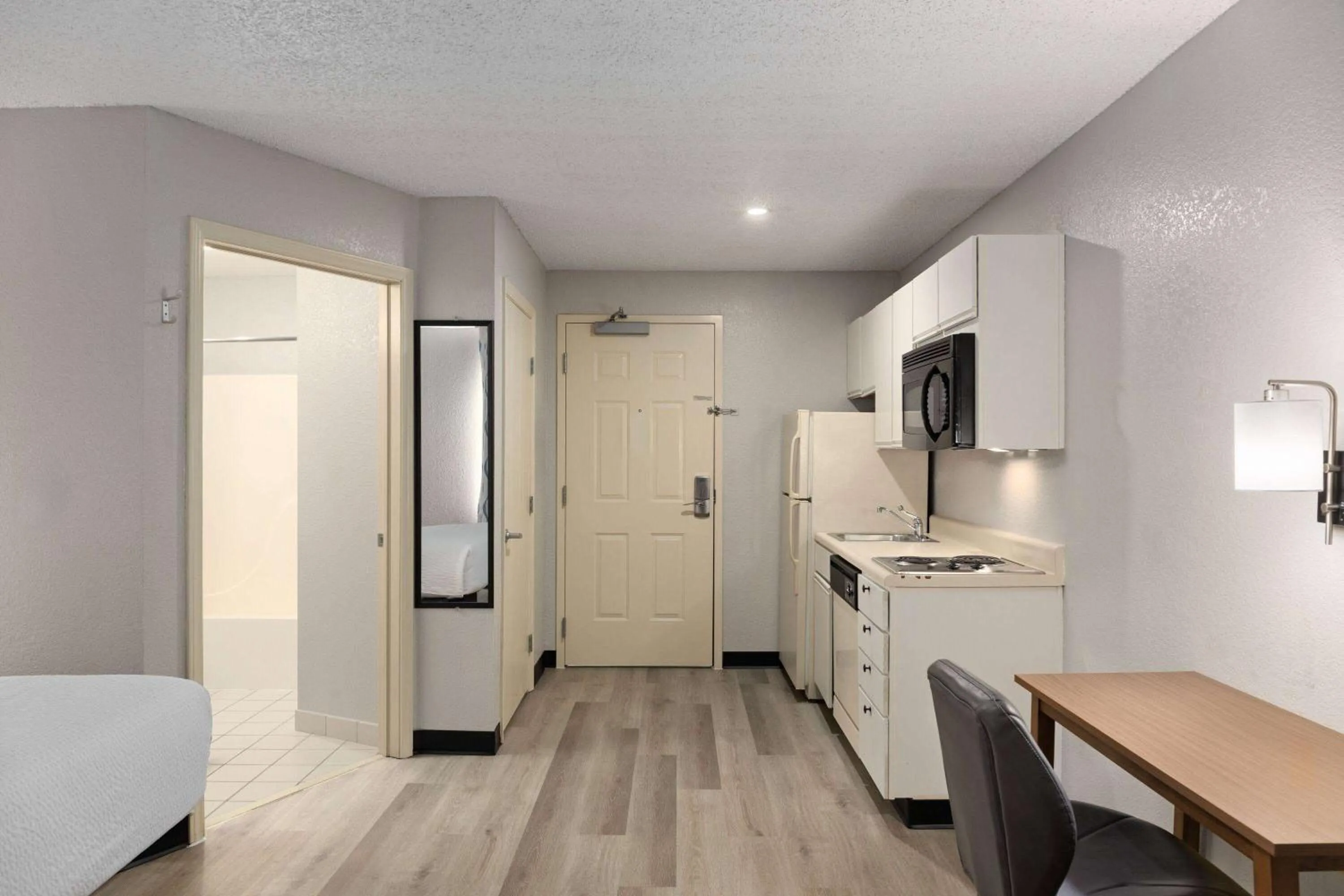 Photo of the whole room in Days Inn & Suites by Wyndham Green Bay WI