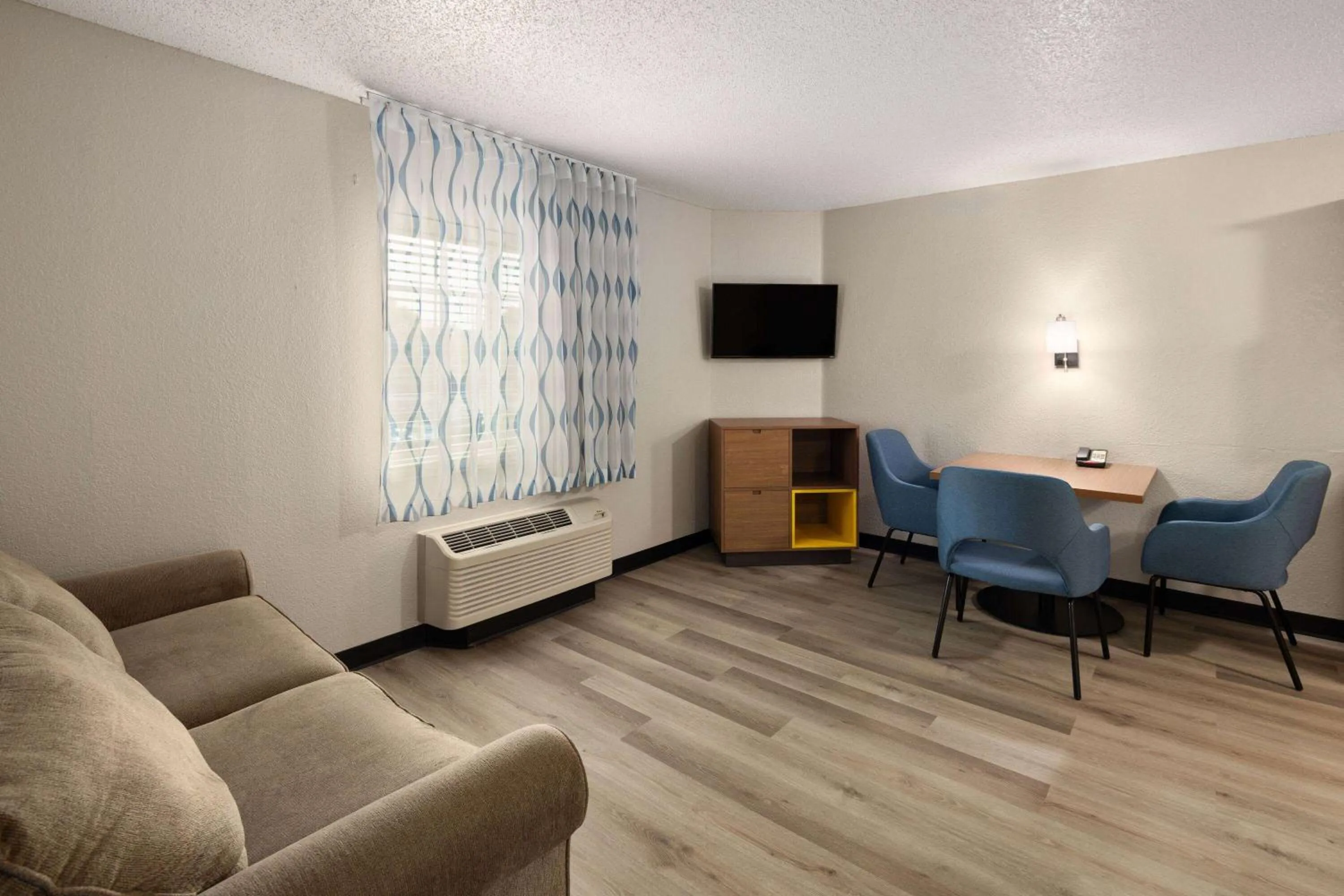 Photo of the whole room in Days Inn & Suites by Wyndham Green Bay WI