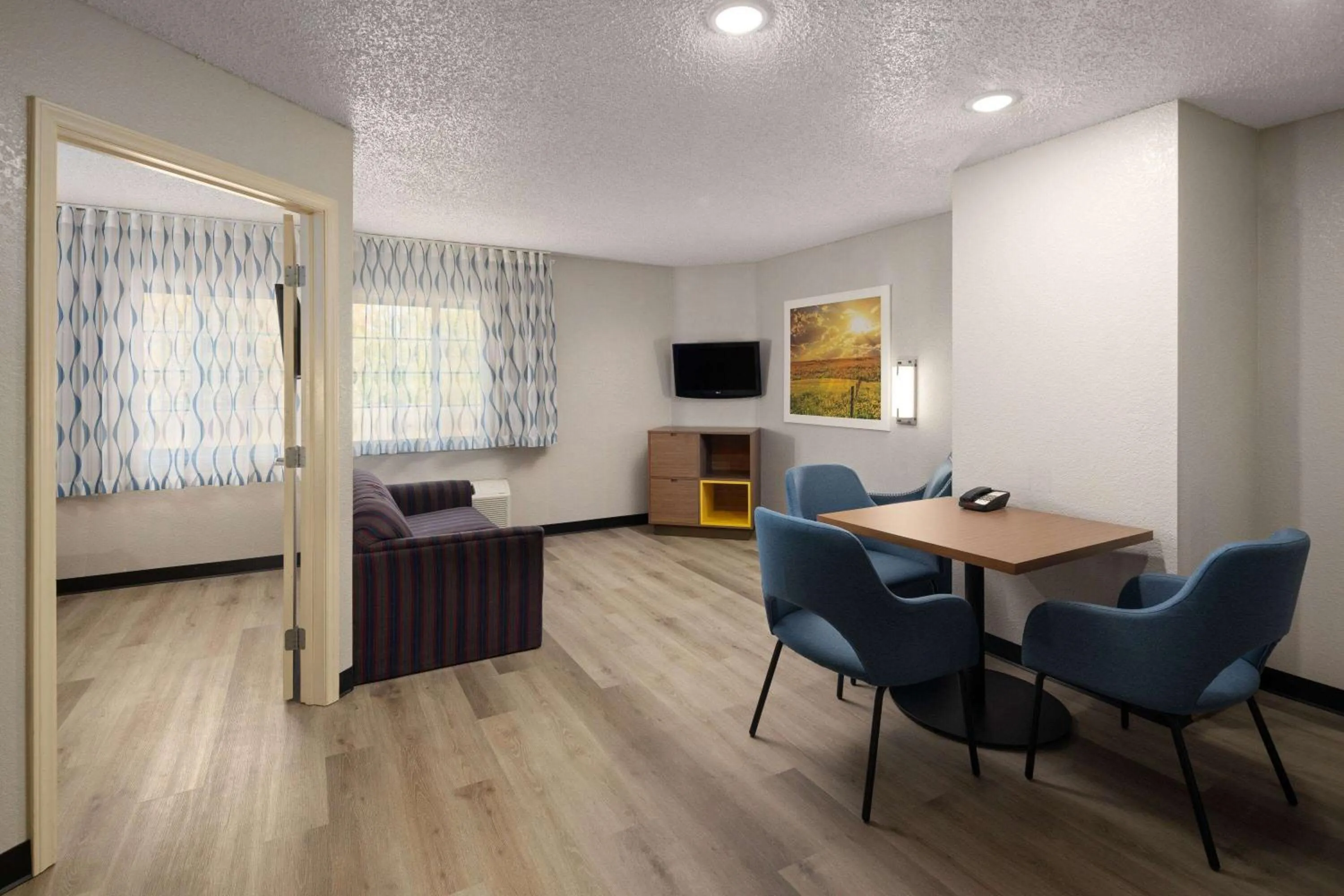 Photo of the whole room in Days Inn & Suites by Wyndham Green Bay WI