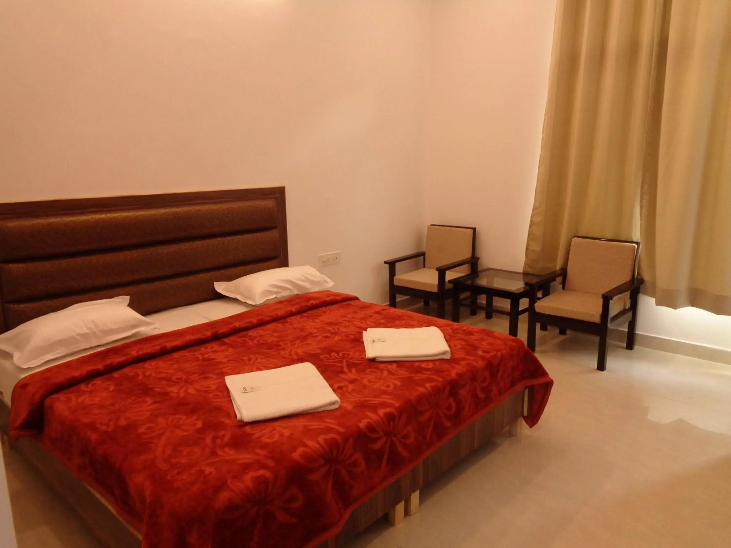 Photo of the whole room, Bed in Hotel Tapovan Cottage Photo of the whole room, Bed in Hotel Tapovan Cottage