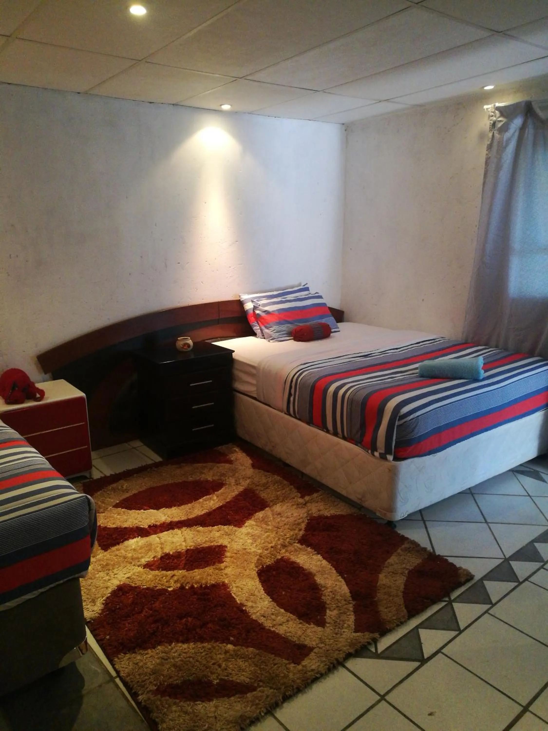 Bed in Naisar Sparkling Apartment