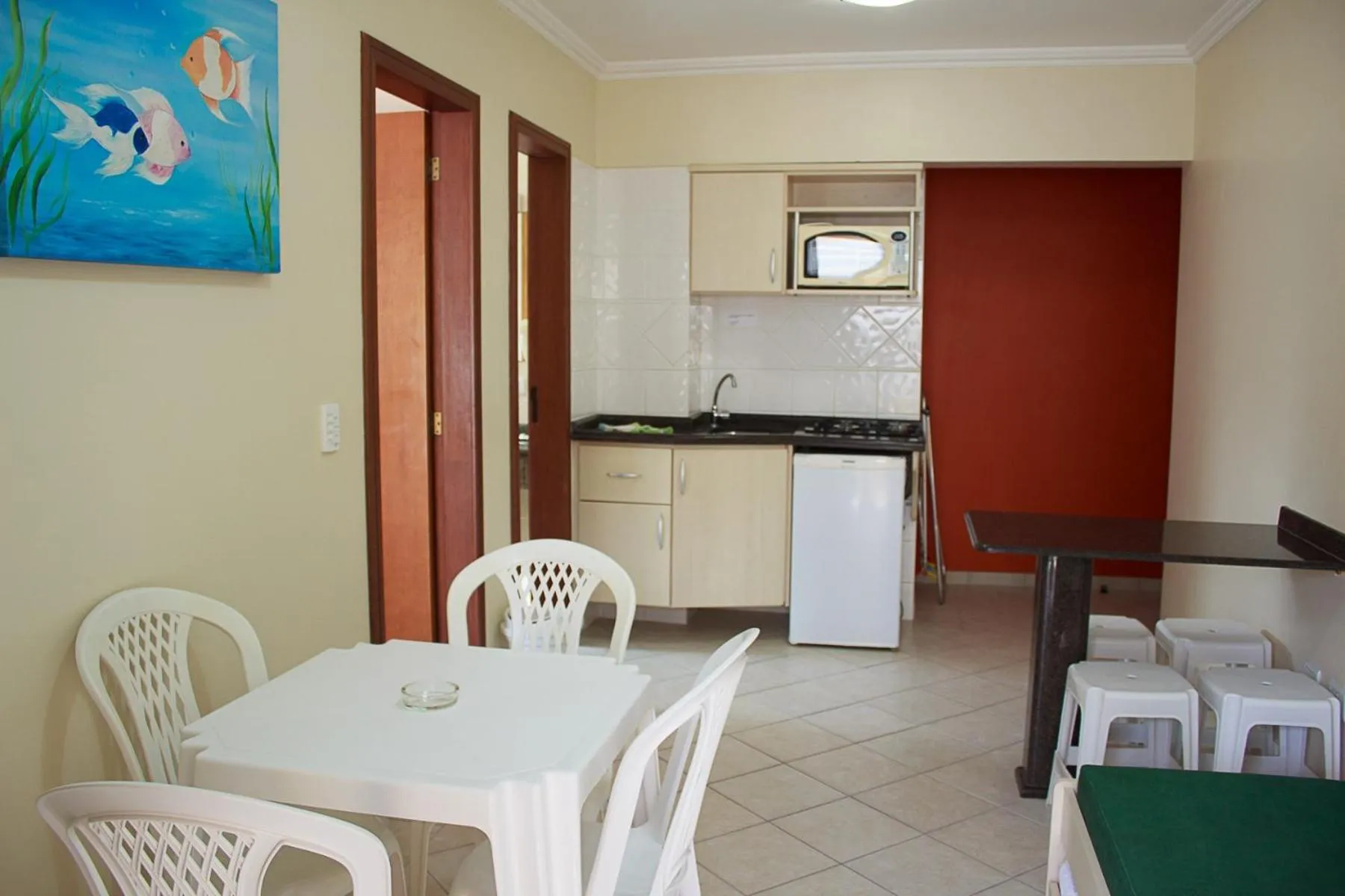Kitchen or kitchenette in Bombinhas Praia Apart Hotel - unidade rua Bem Te Vi
