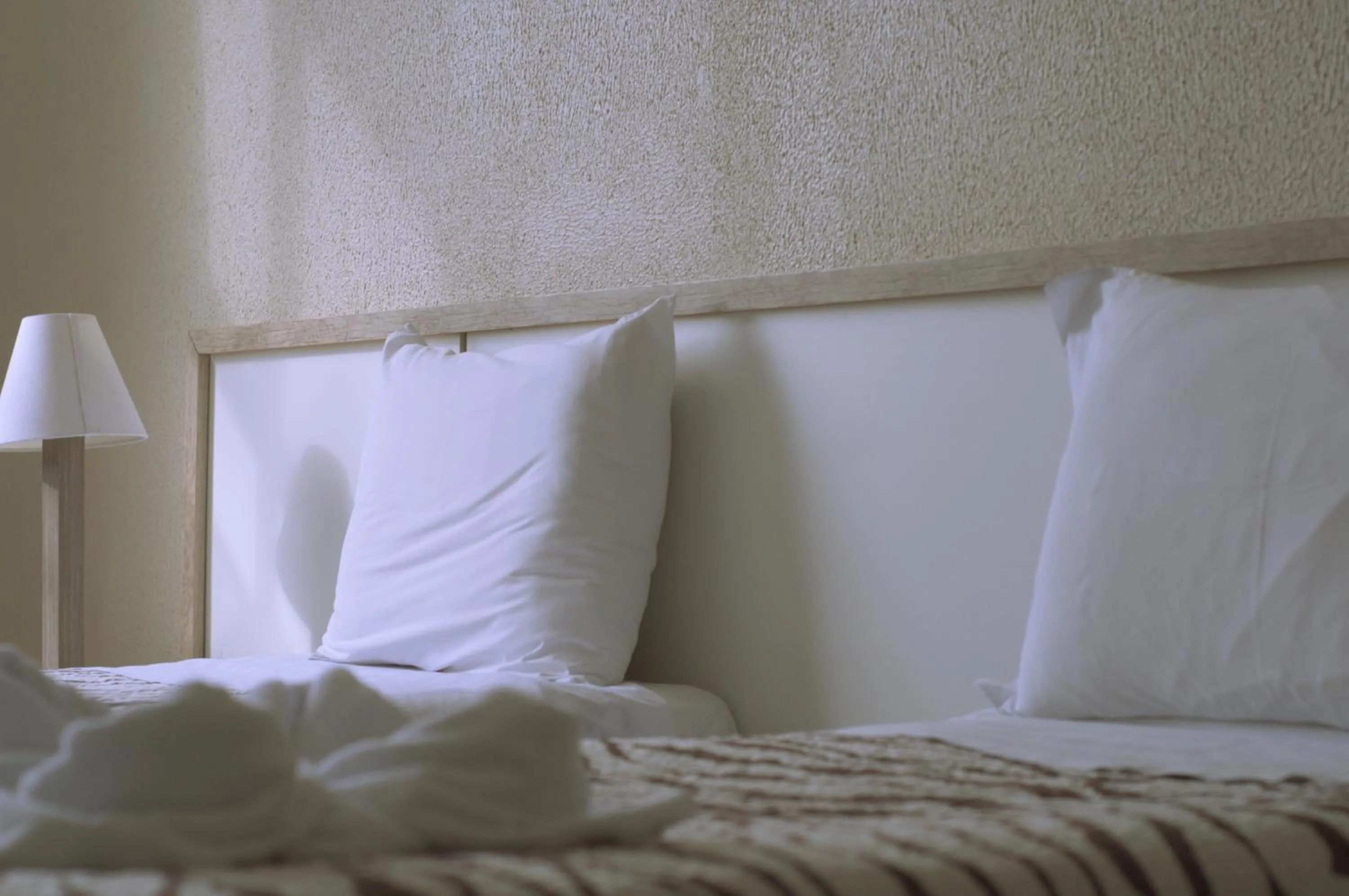 Bed in Crigial Hotel