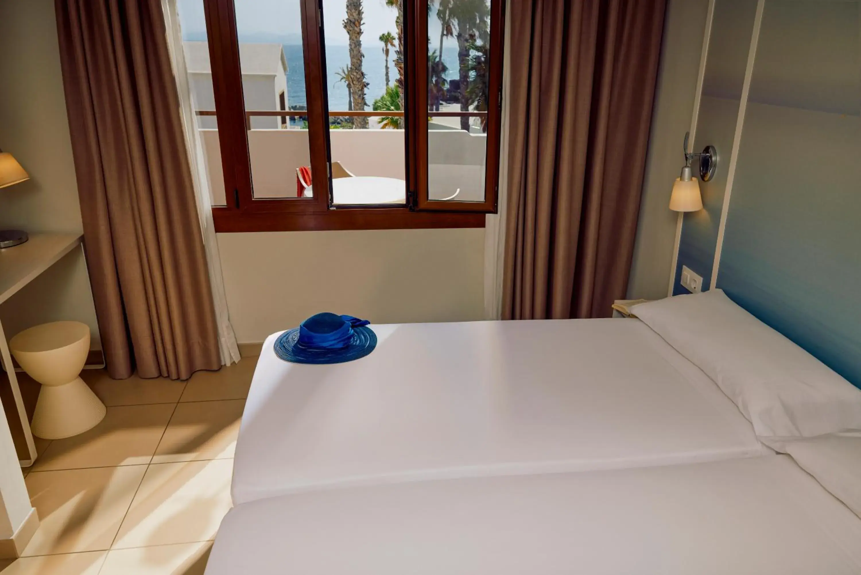 Bed in Grupotel Flamingo Beach Bed in Grupotel Flamingo Beach