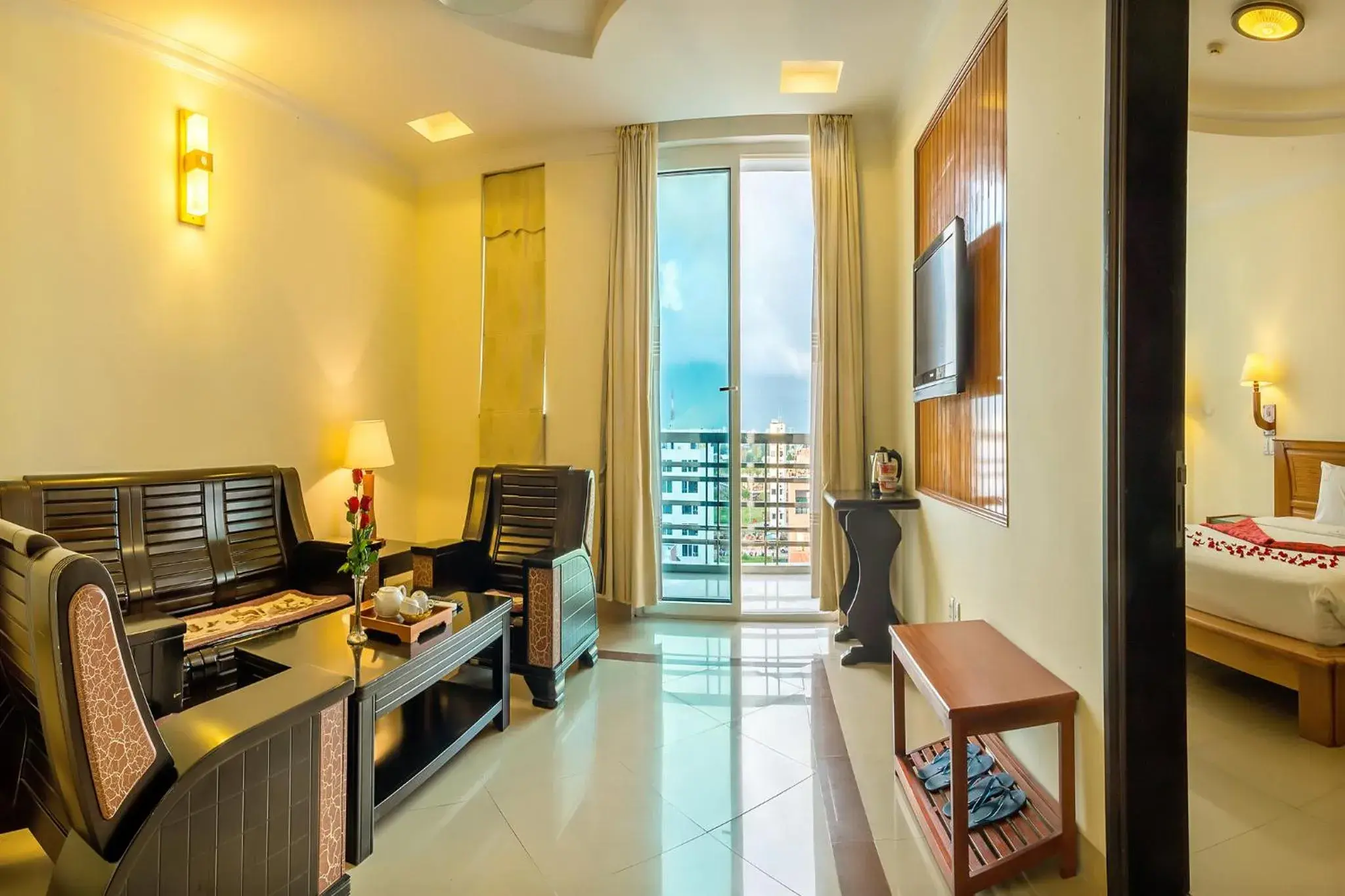 Living room, Bed in Golden Sea Hotel Da Nang Living room, Bed in Golden Sea Hotel Da Nang