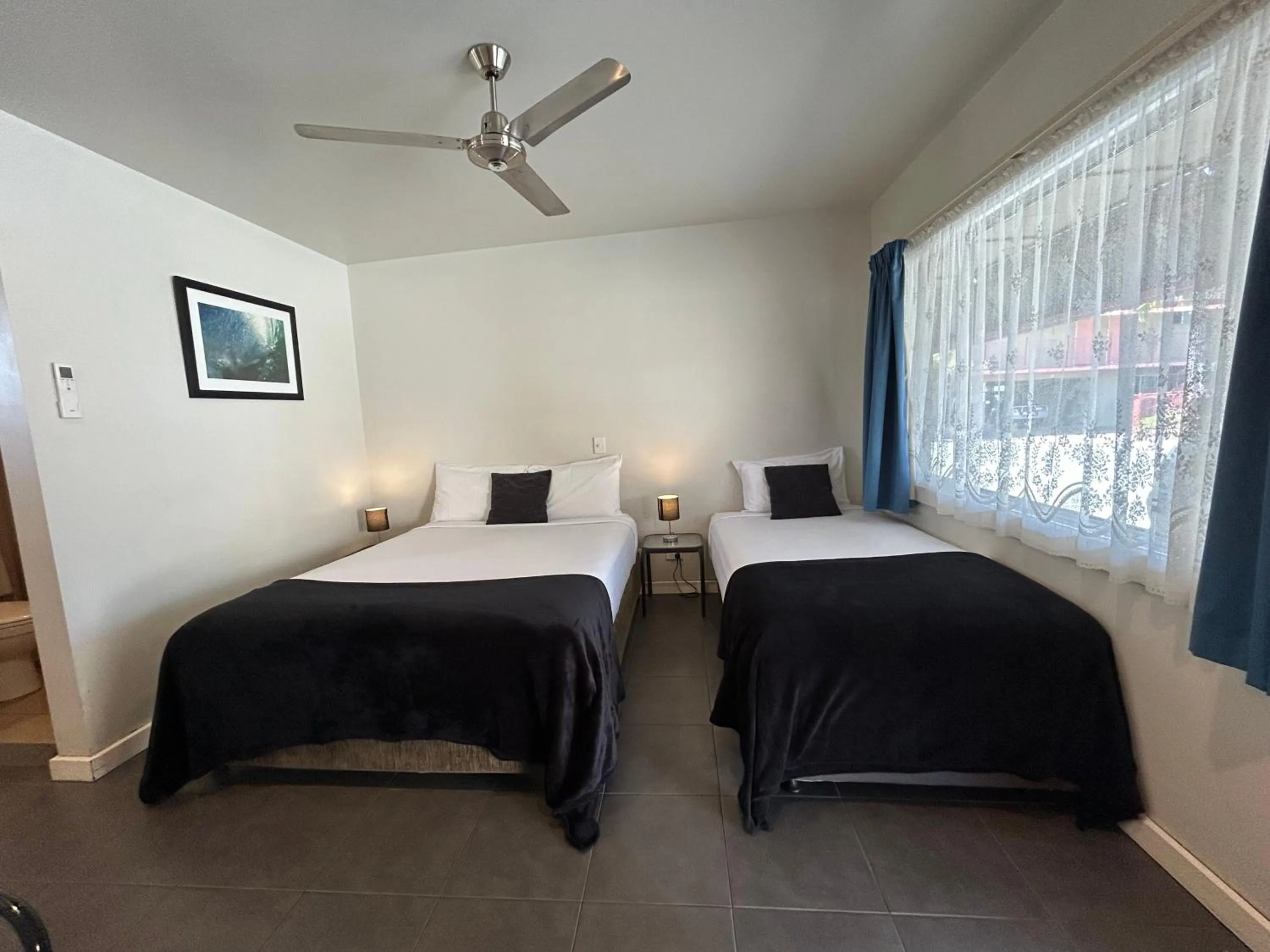 Bed in Tweed River Motel