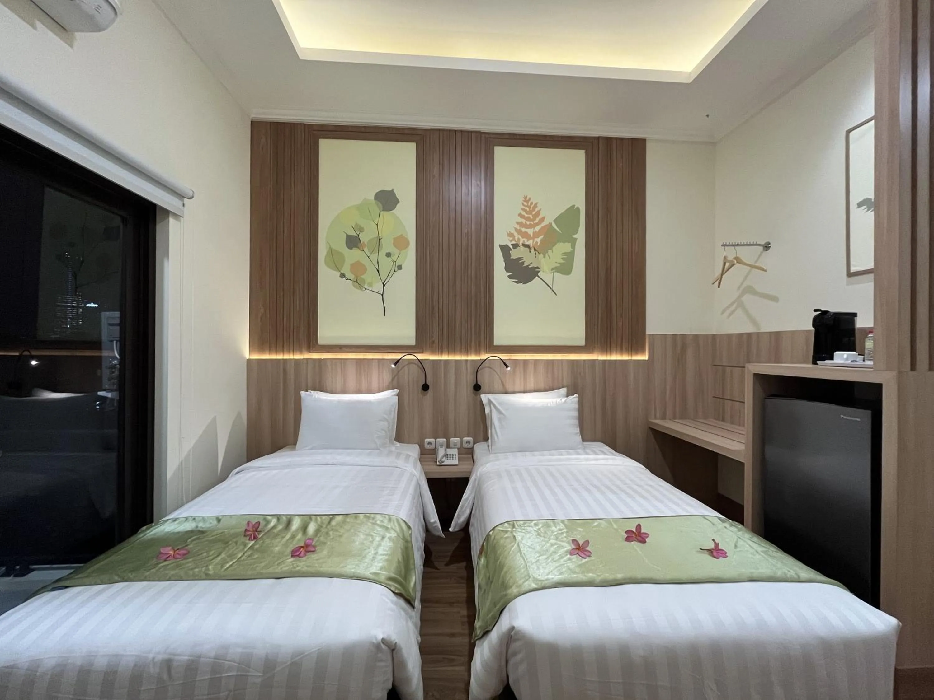 Bed in D'Bamboo Suites