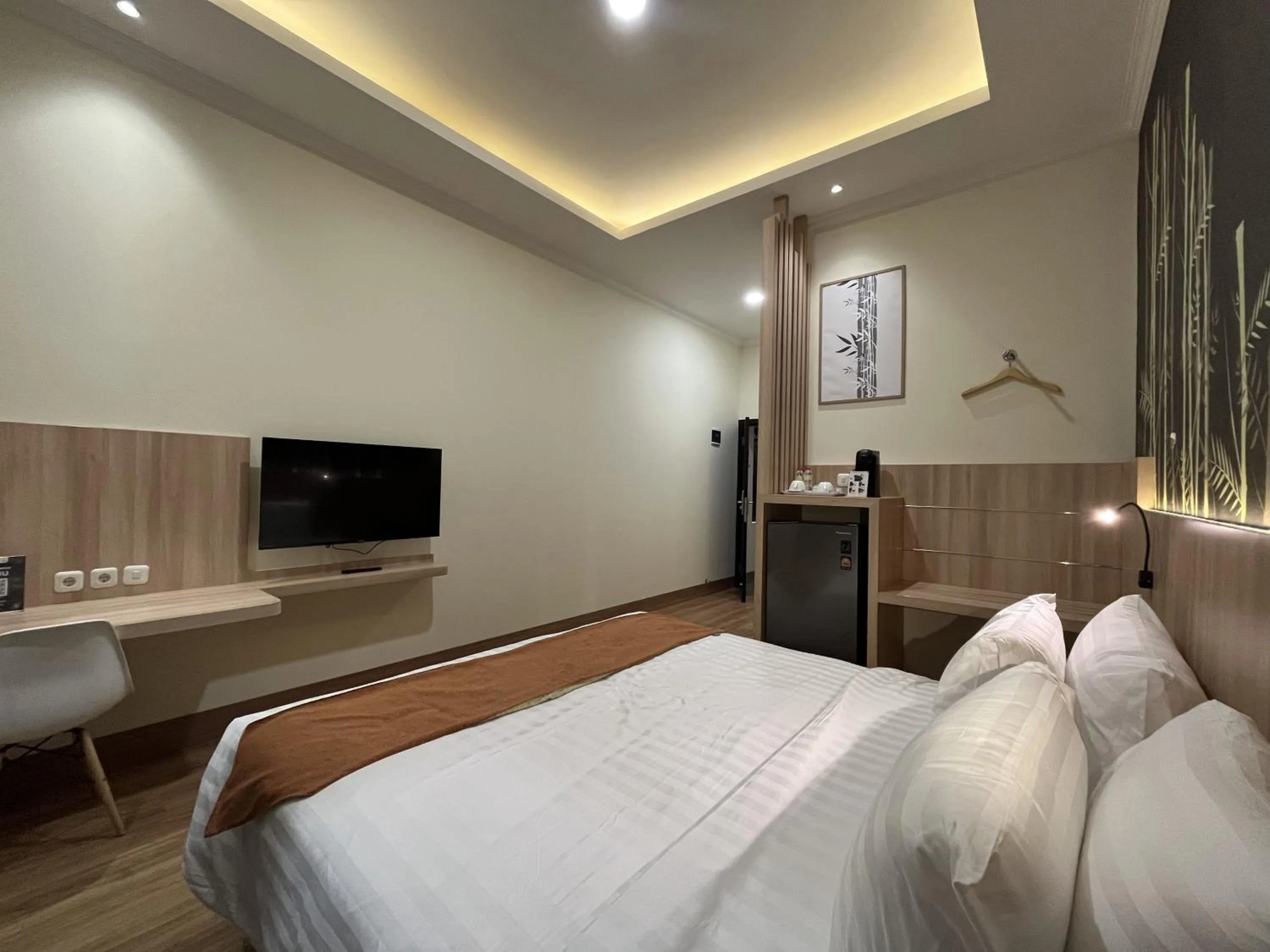 Bed in D'Bamboo Suites