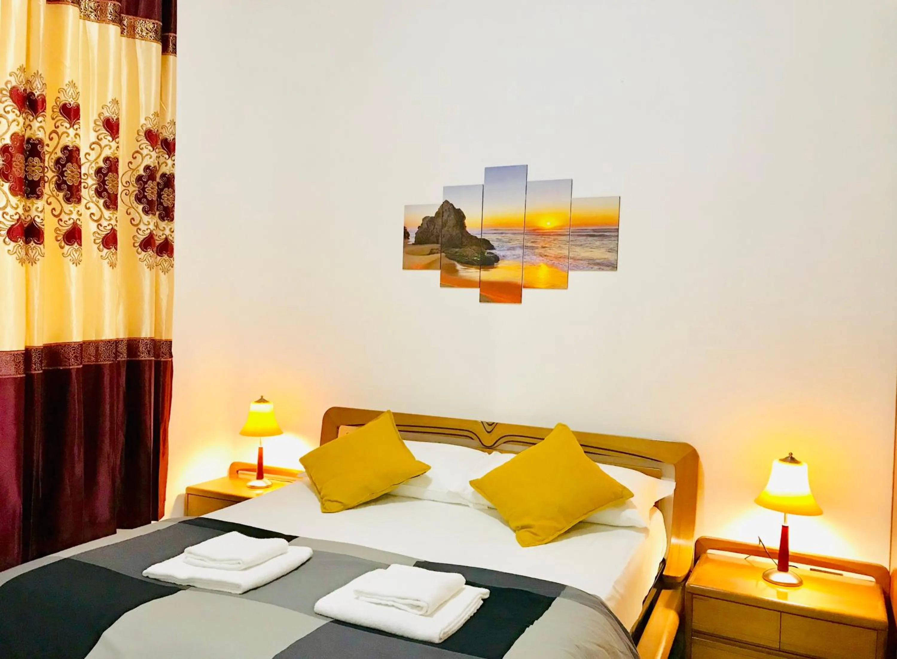 Bed in COLOSSEUM LUXURY ROOM