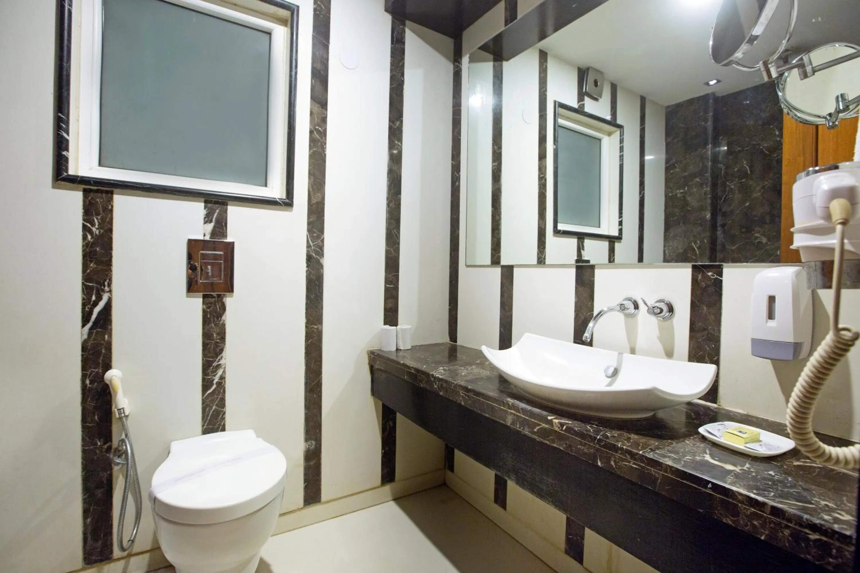 Bathroom in Hotel Krishna Deluxe-By RCG Hotels