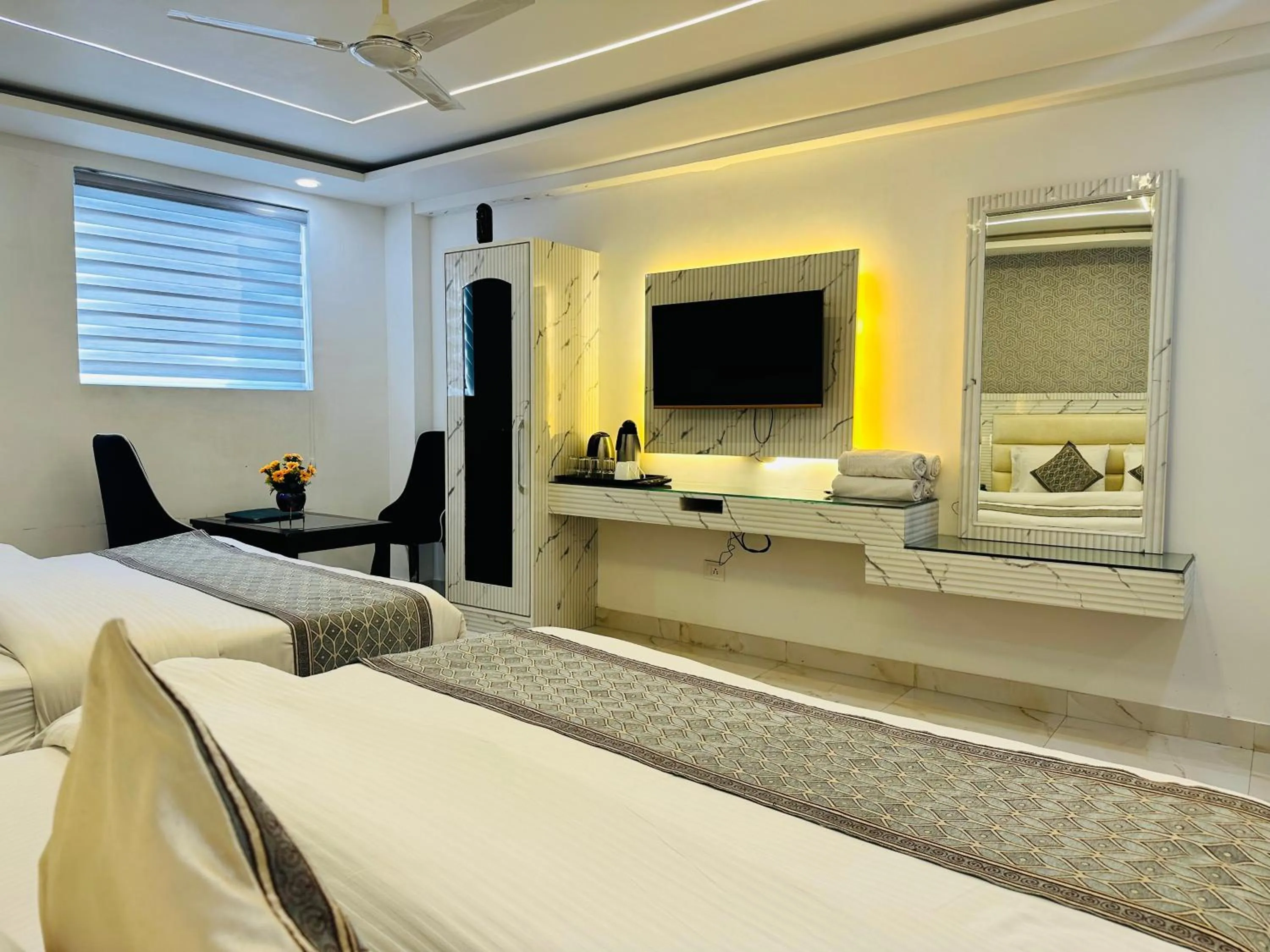 TV and multimedia, Bed in Hotel Krishna Deluxe-By RCG Hotels