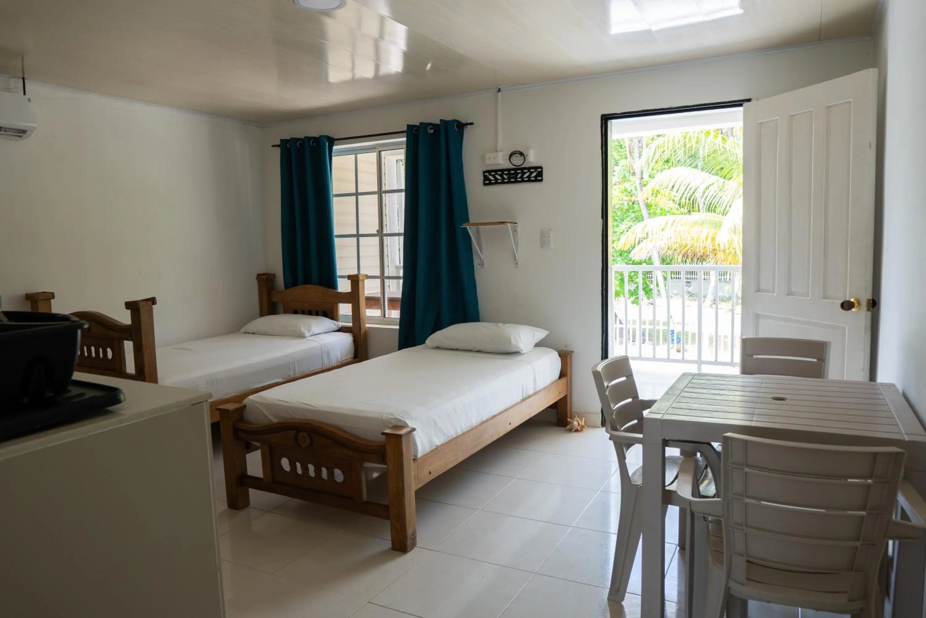 Bed in Rocky Cay Lodging