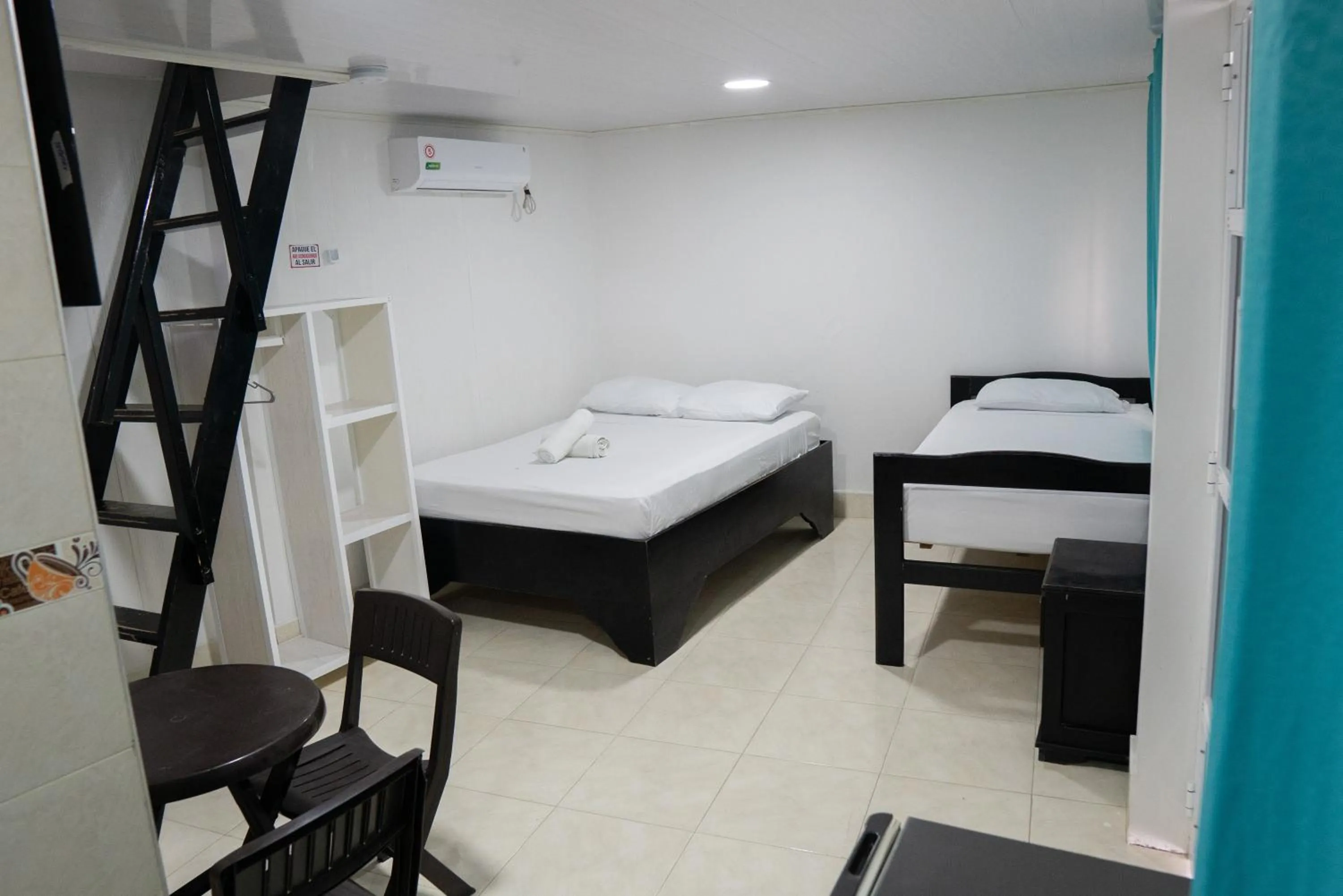 Bed in Rocky Cay Lodging