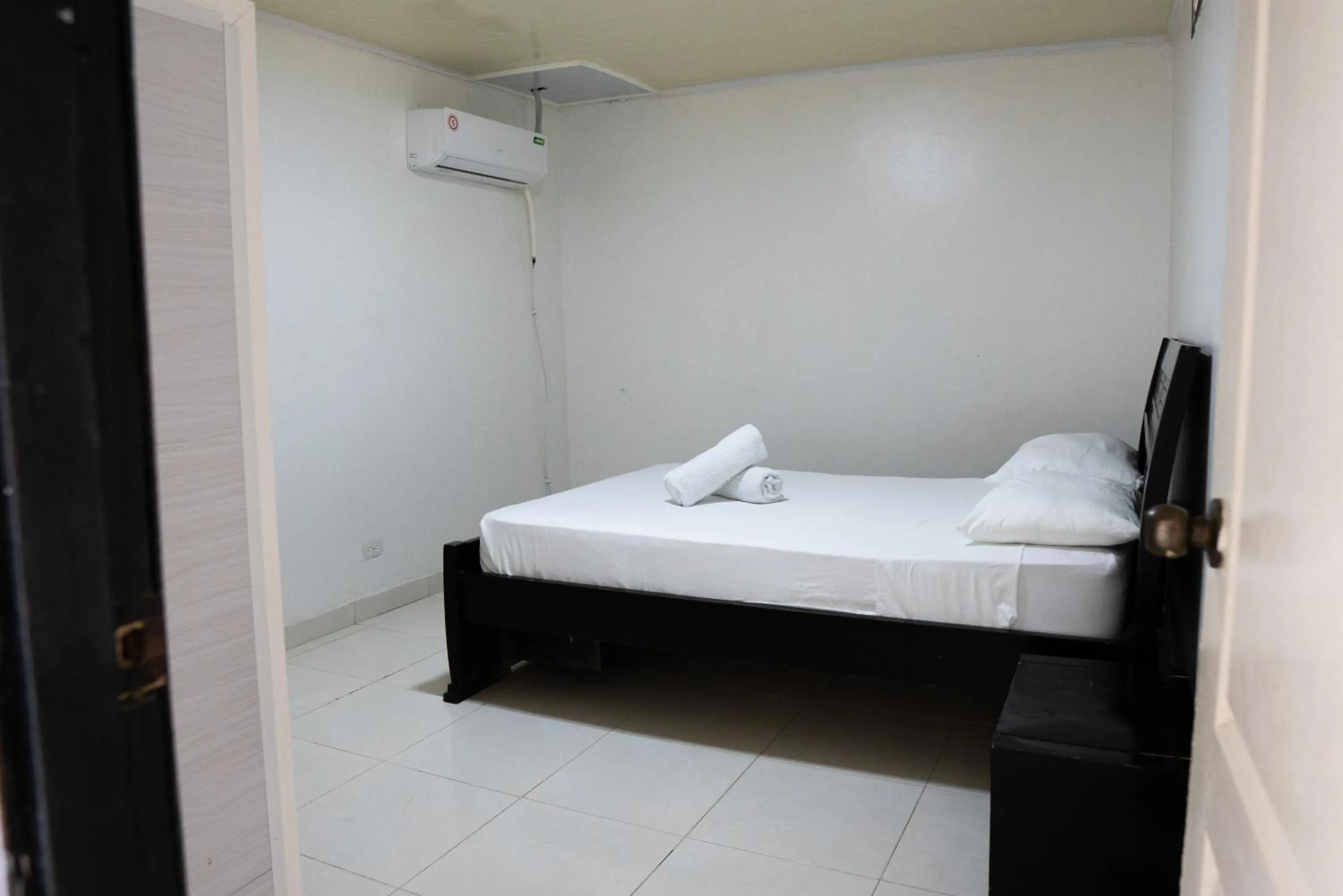 Bed in Rocky Cay Lodging