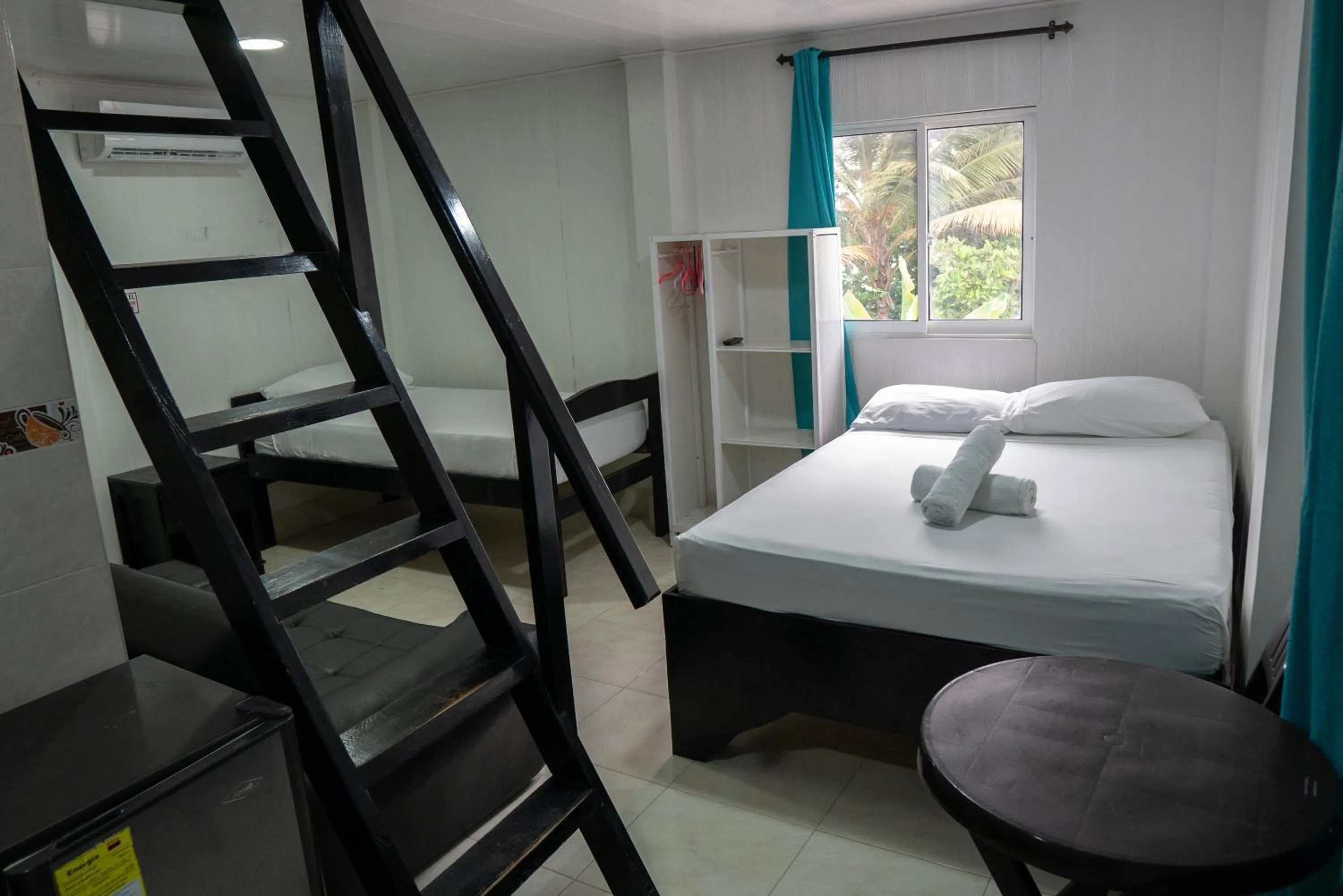 Bed in Rocky Cay Lodging