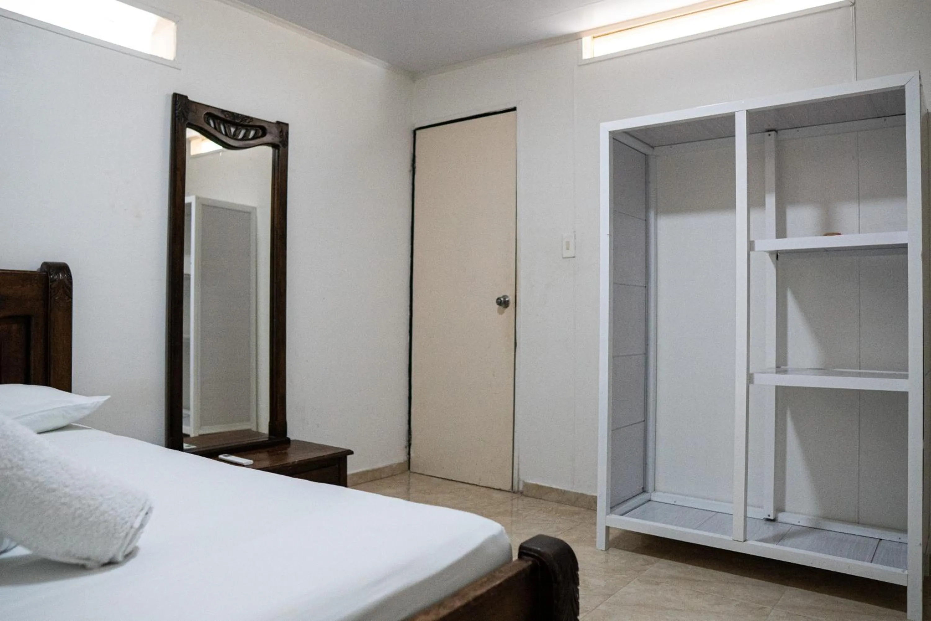 Bed in Rocky Cay Lodging