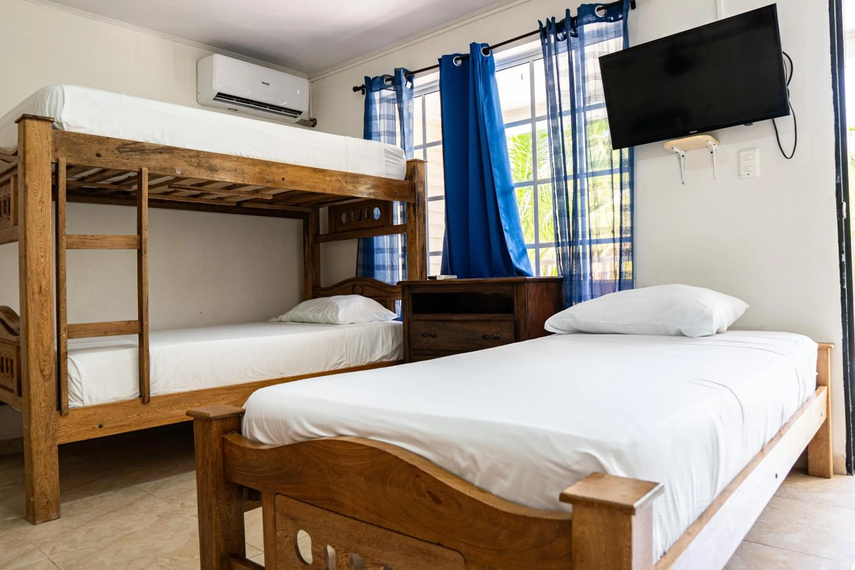 Bed in Rocky Cay Lodging