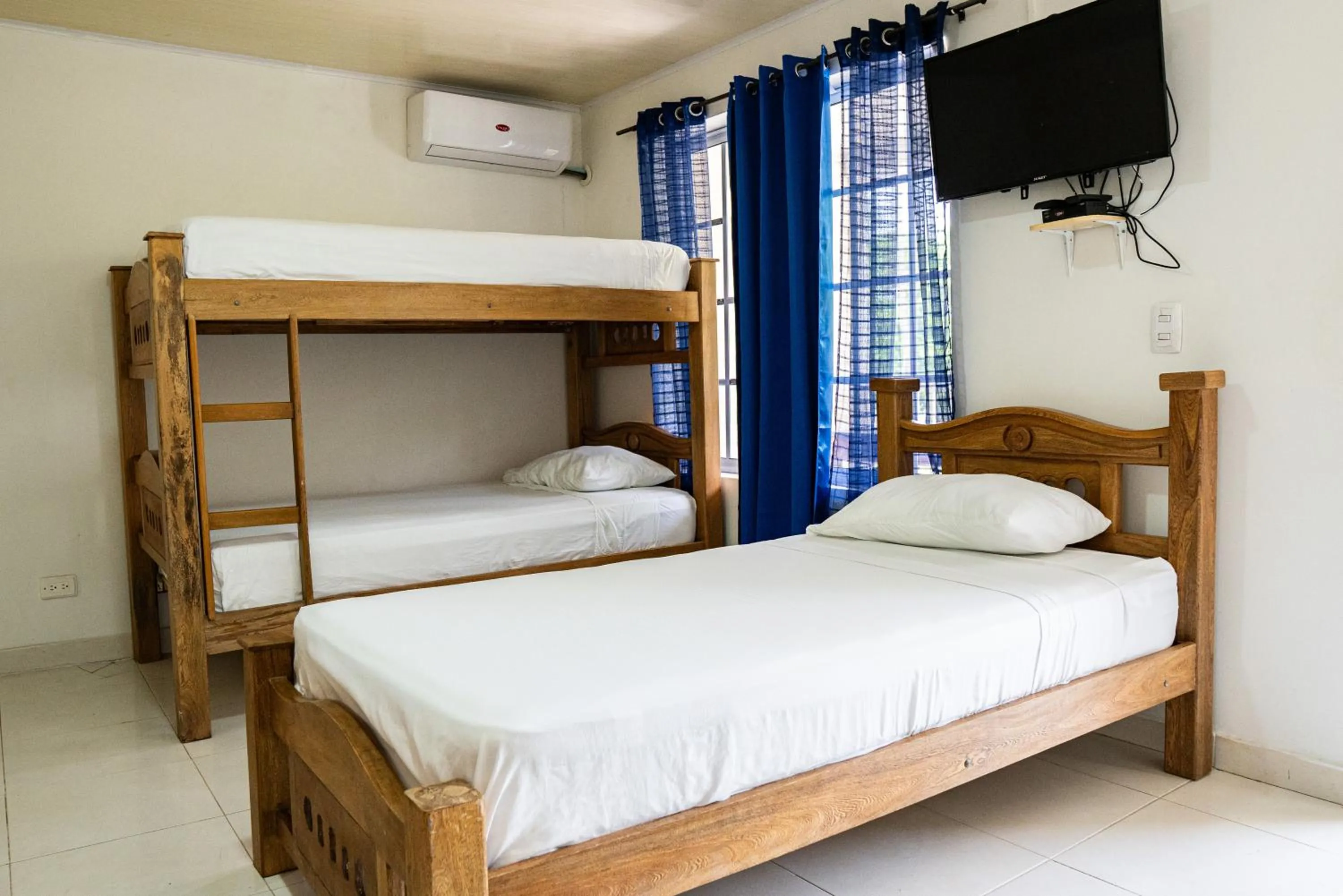 Bed in Rocky Cay Lodging