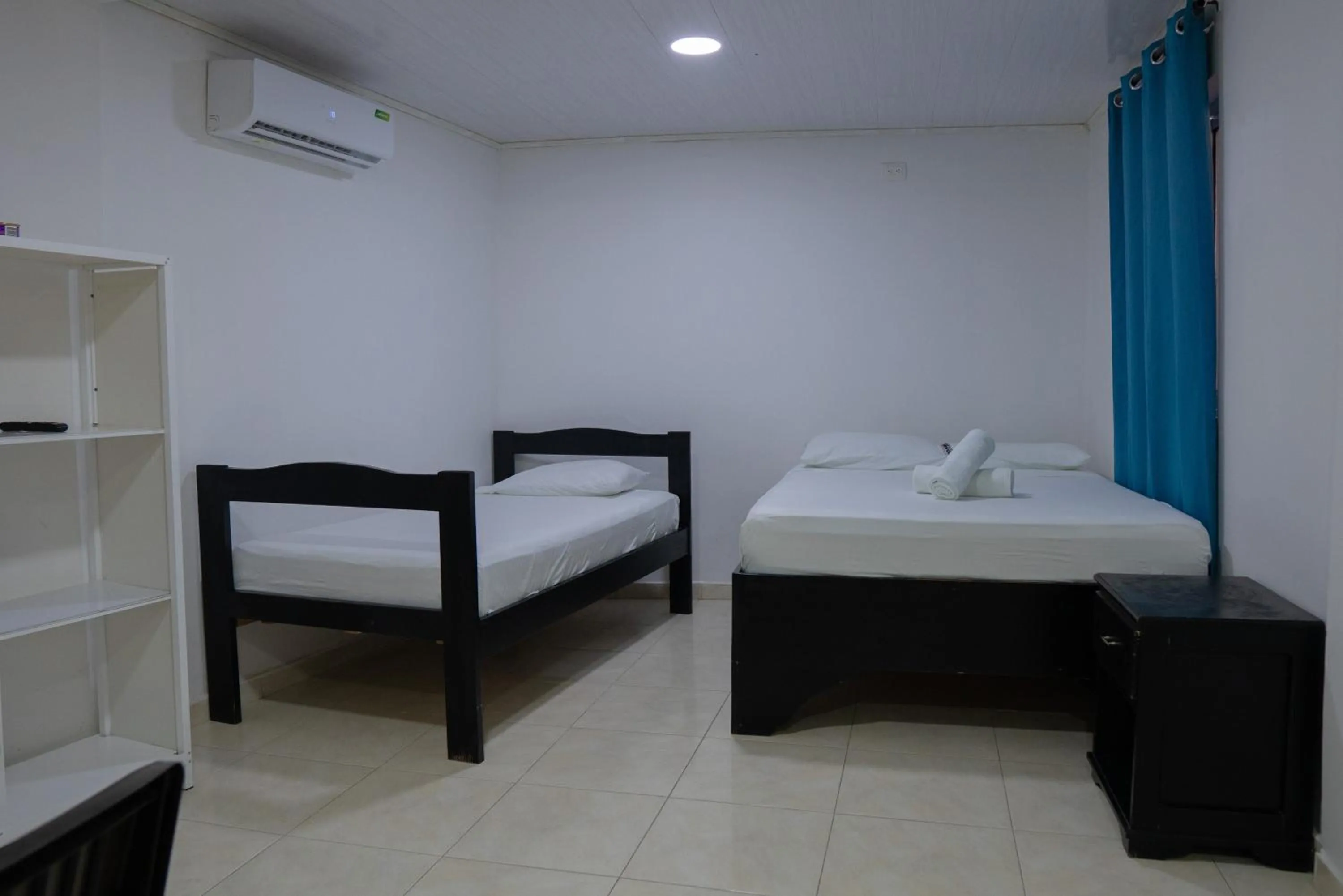 Bed in Rocky Cay Lodging