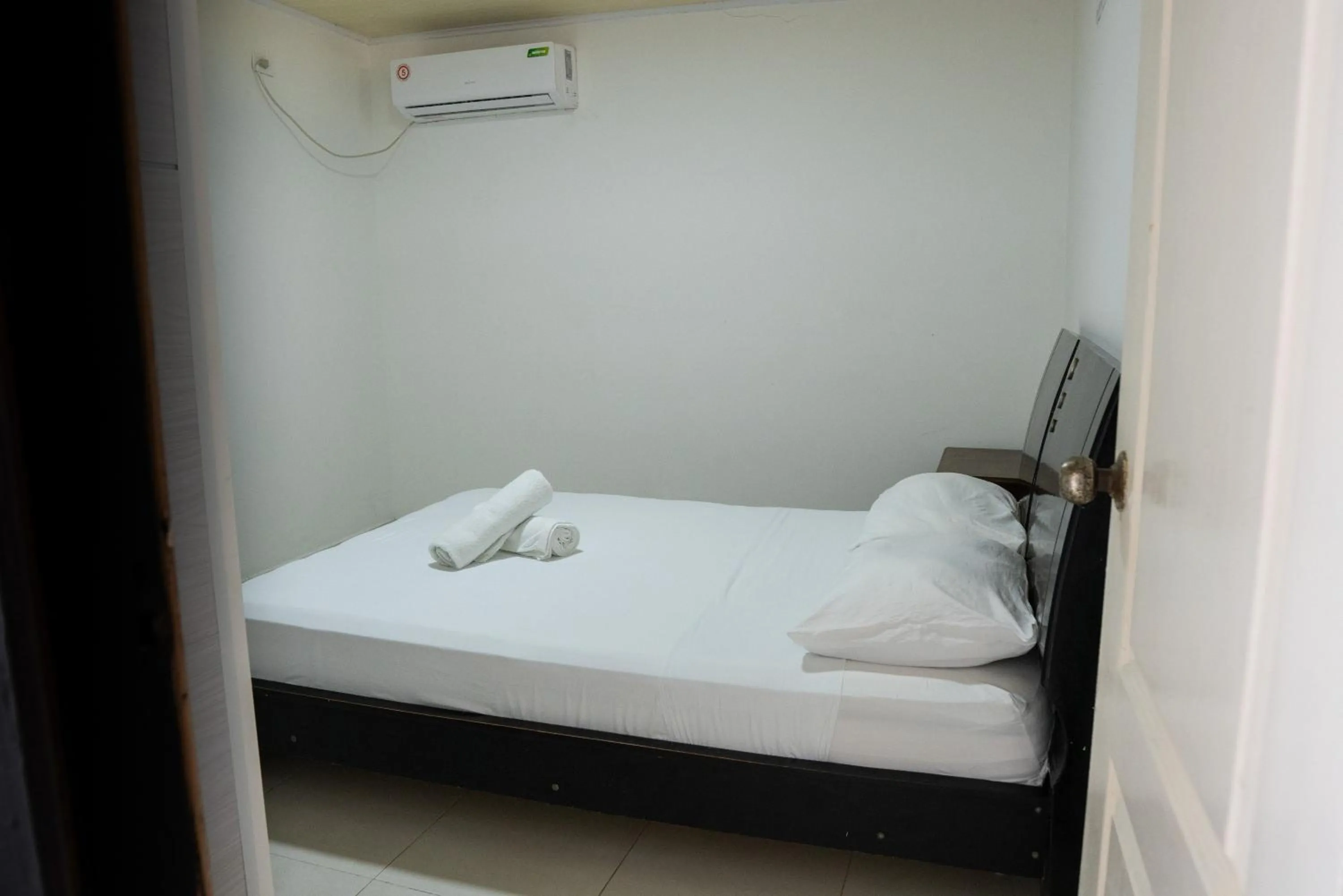 Bed in Rocky Cay Lodging