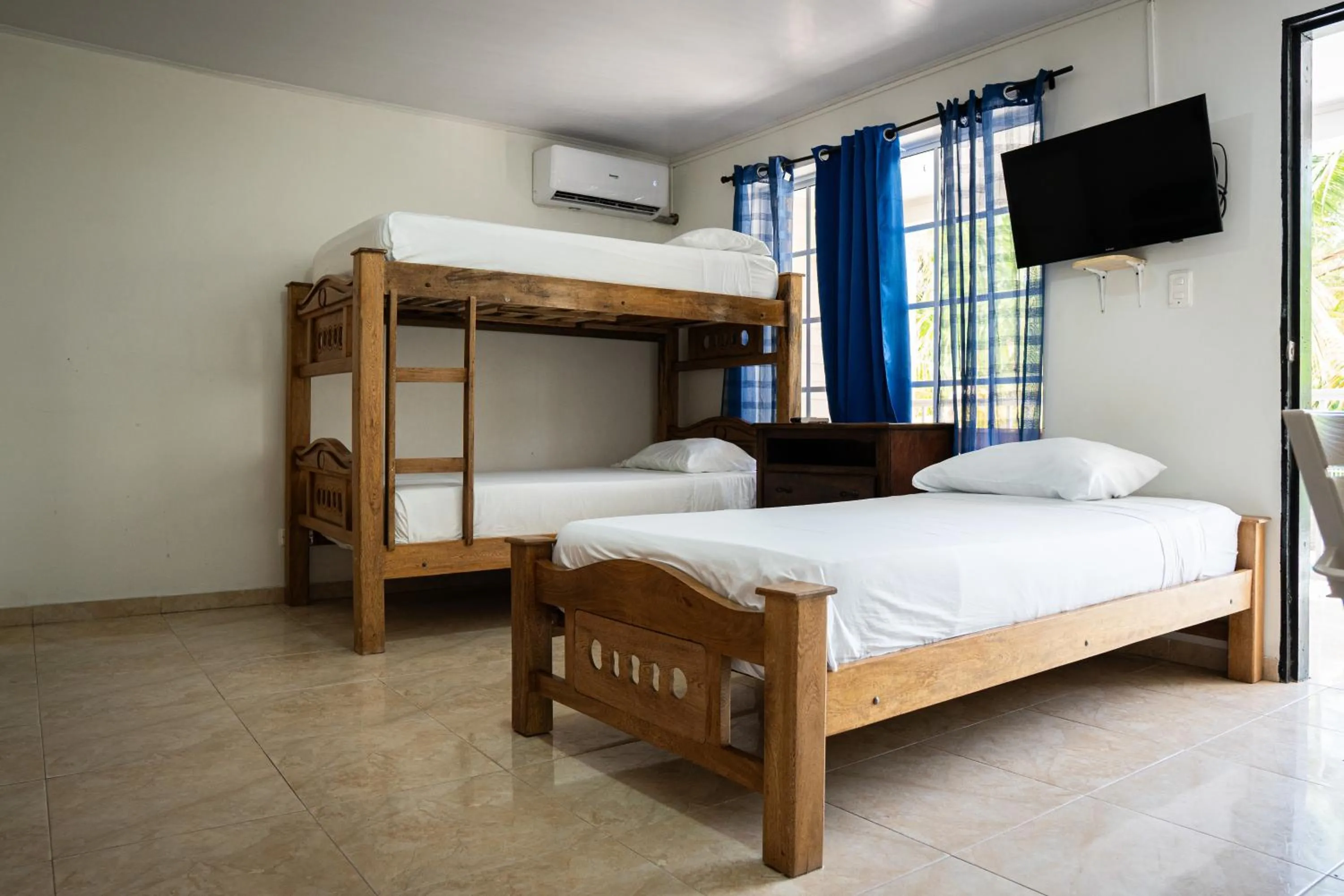 Bed in Rocky Cay Lodging