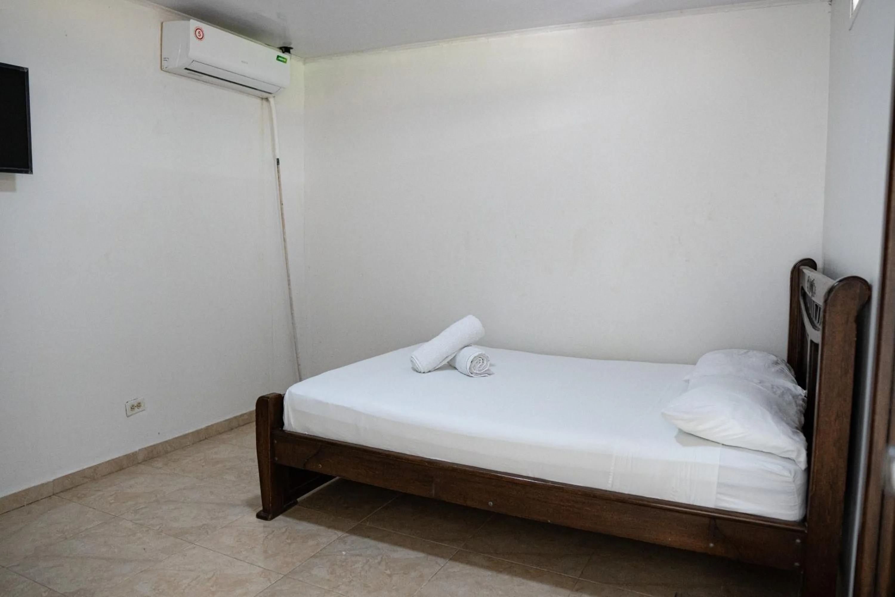 Bed in Rocky Cay Lodging