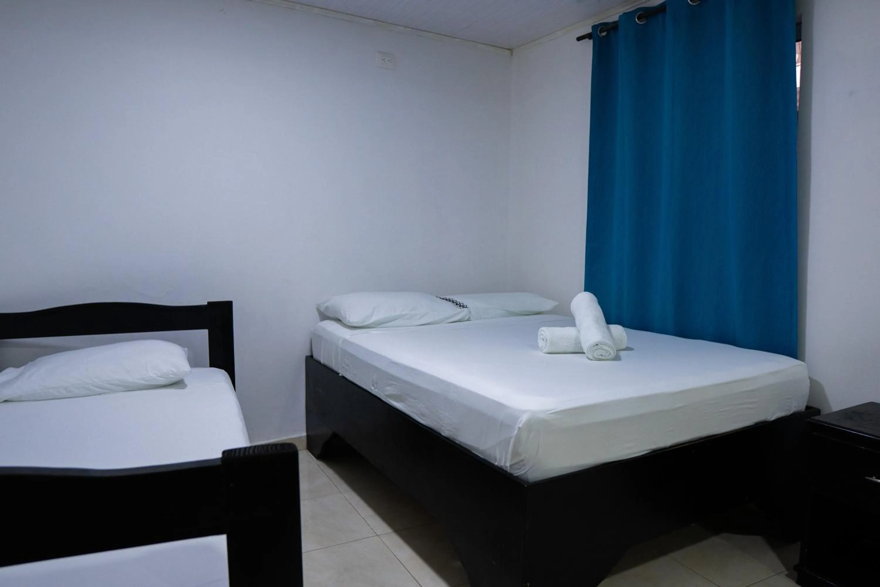 Bed in Rocky Cay Lodging