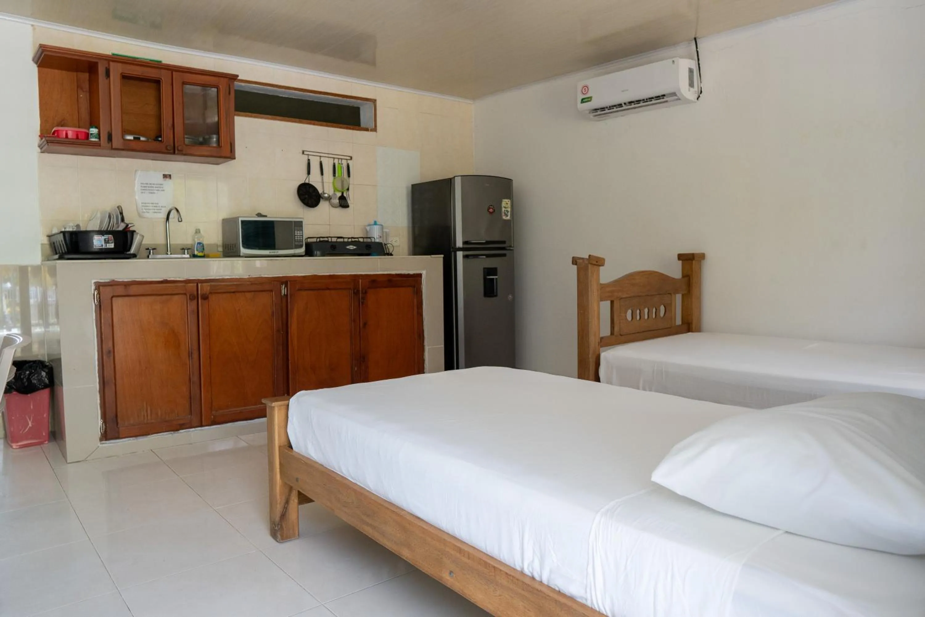 Bed in Rocky Cay Lodging