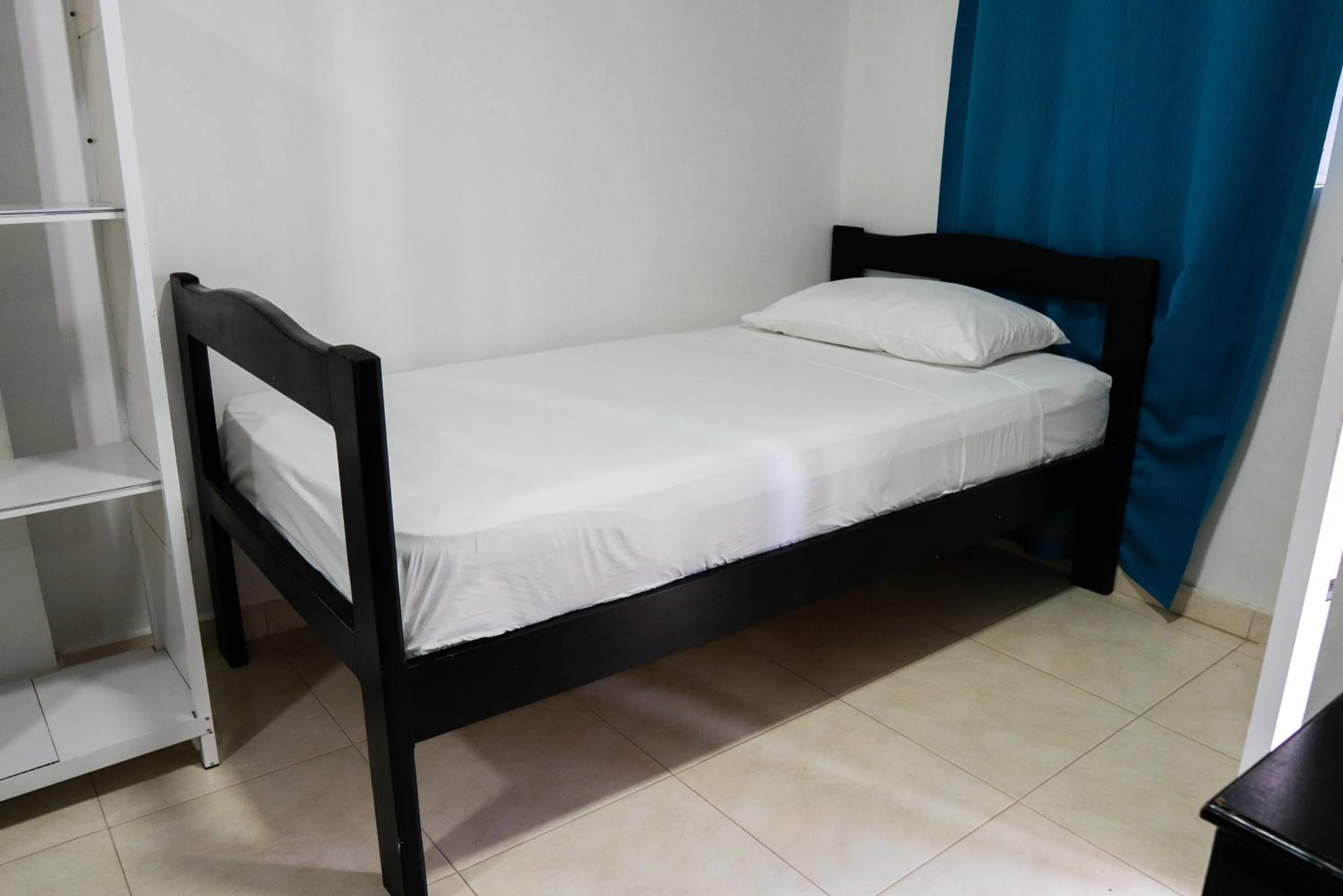 Bed in Rocky Cay Lodging