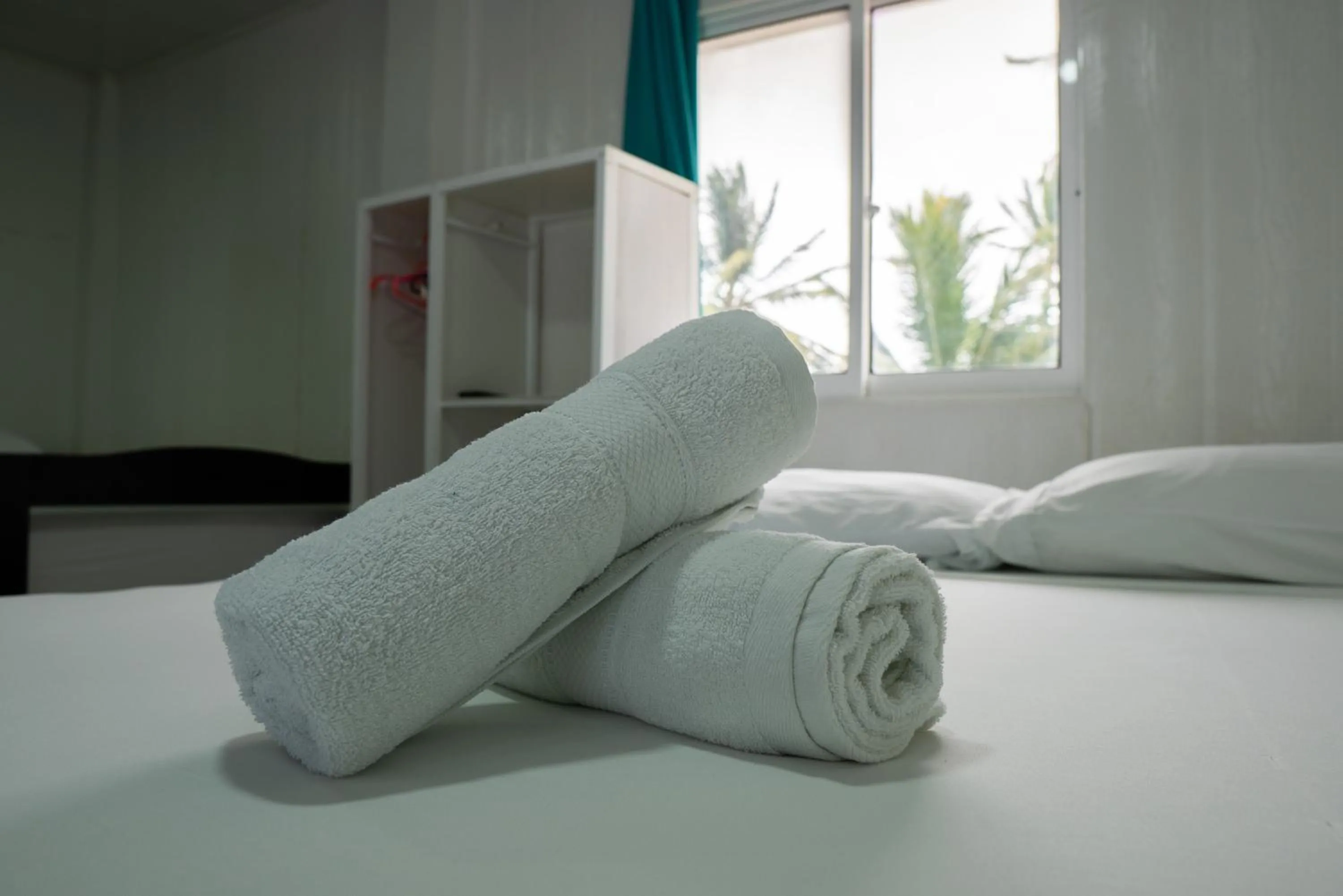 Bed in Rocky Cay Lodging