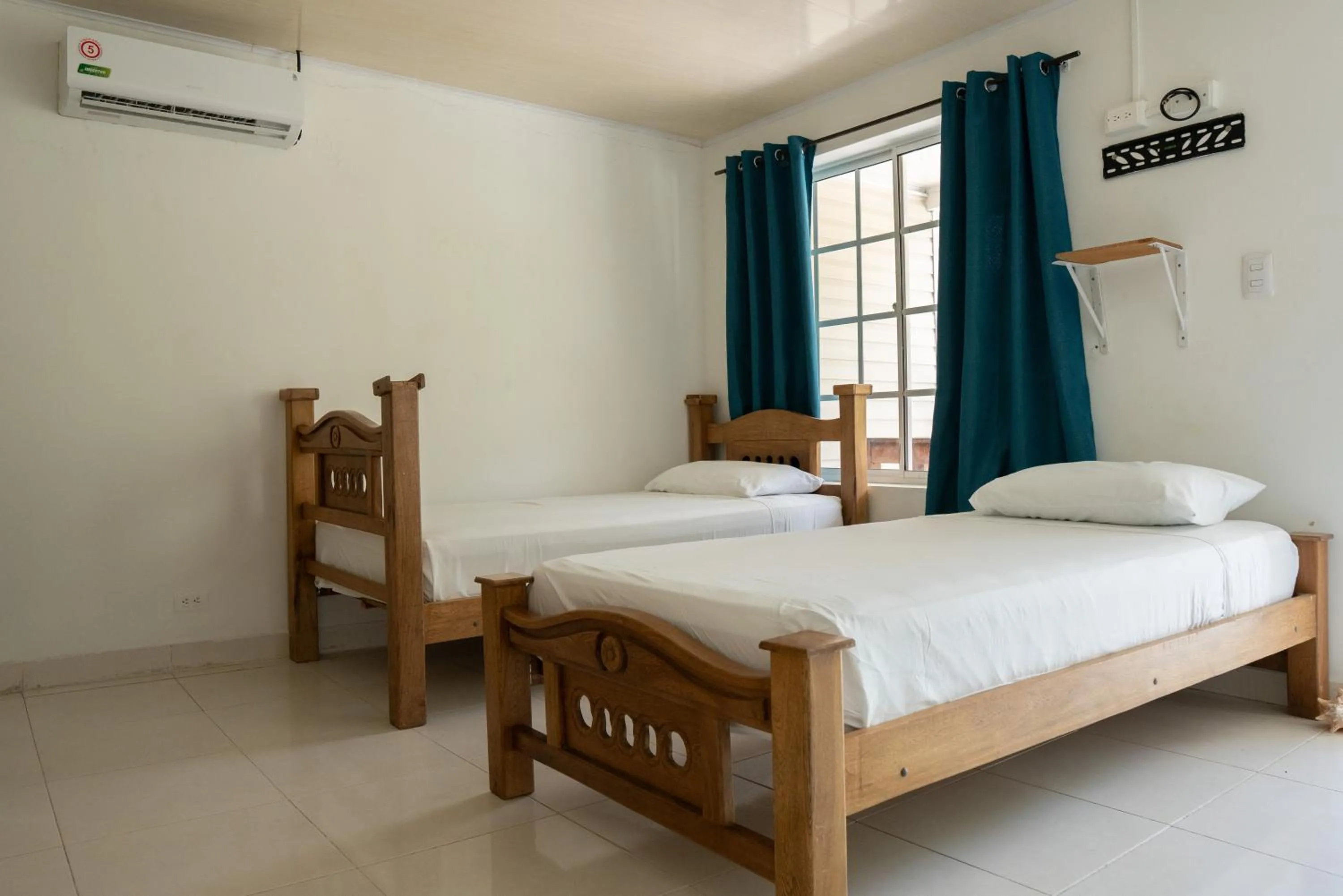 Bed in Rocky Cay Lodging