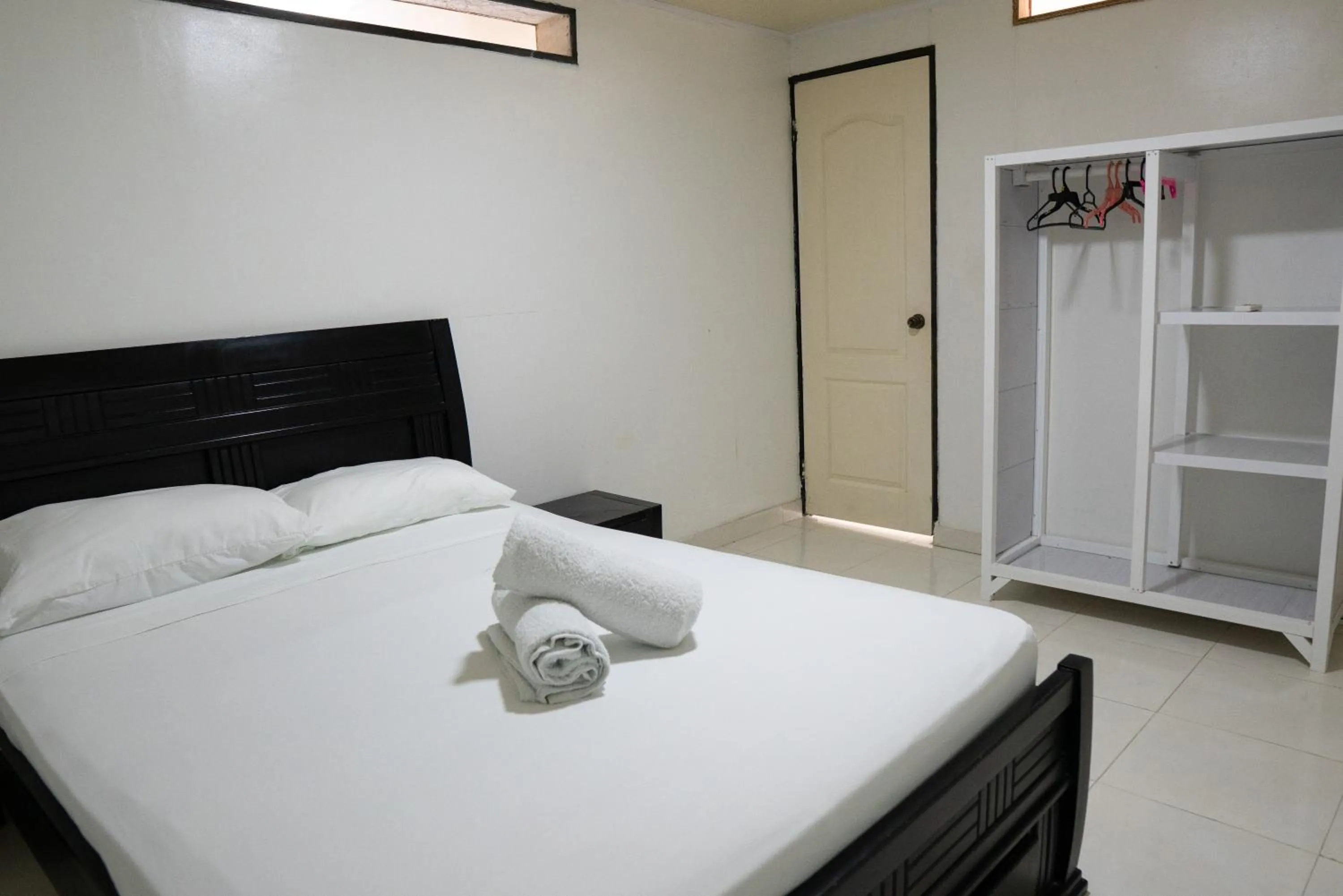 Bed in Rocky Cay Lodging