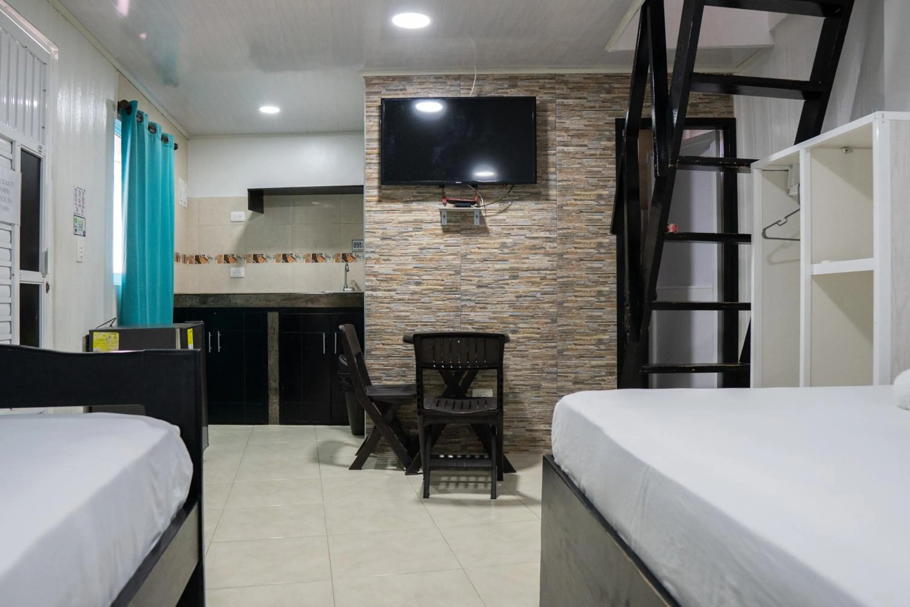 Bed in Rocky Cay Lodging