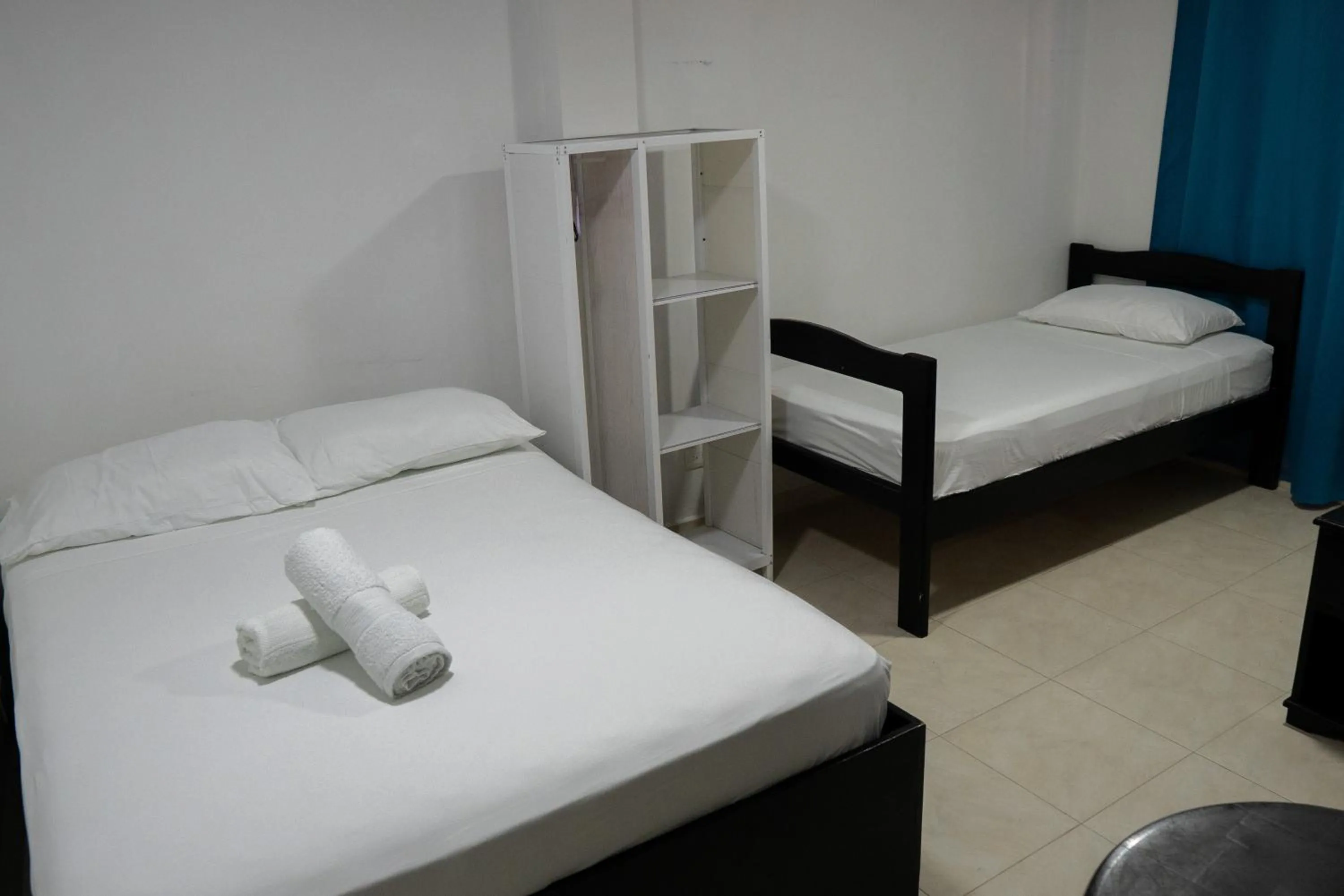 Bed in Rocky Cay Lodging
