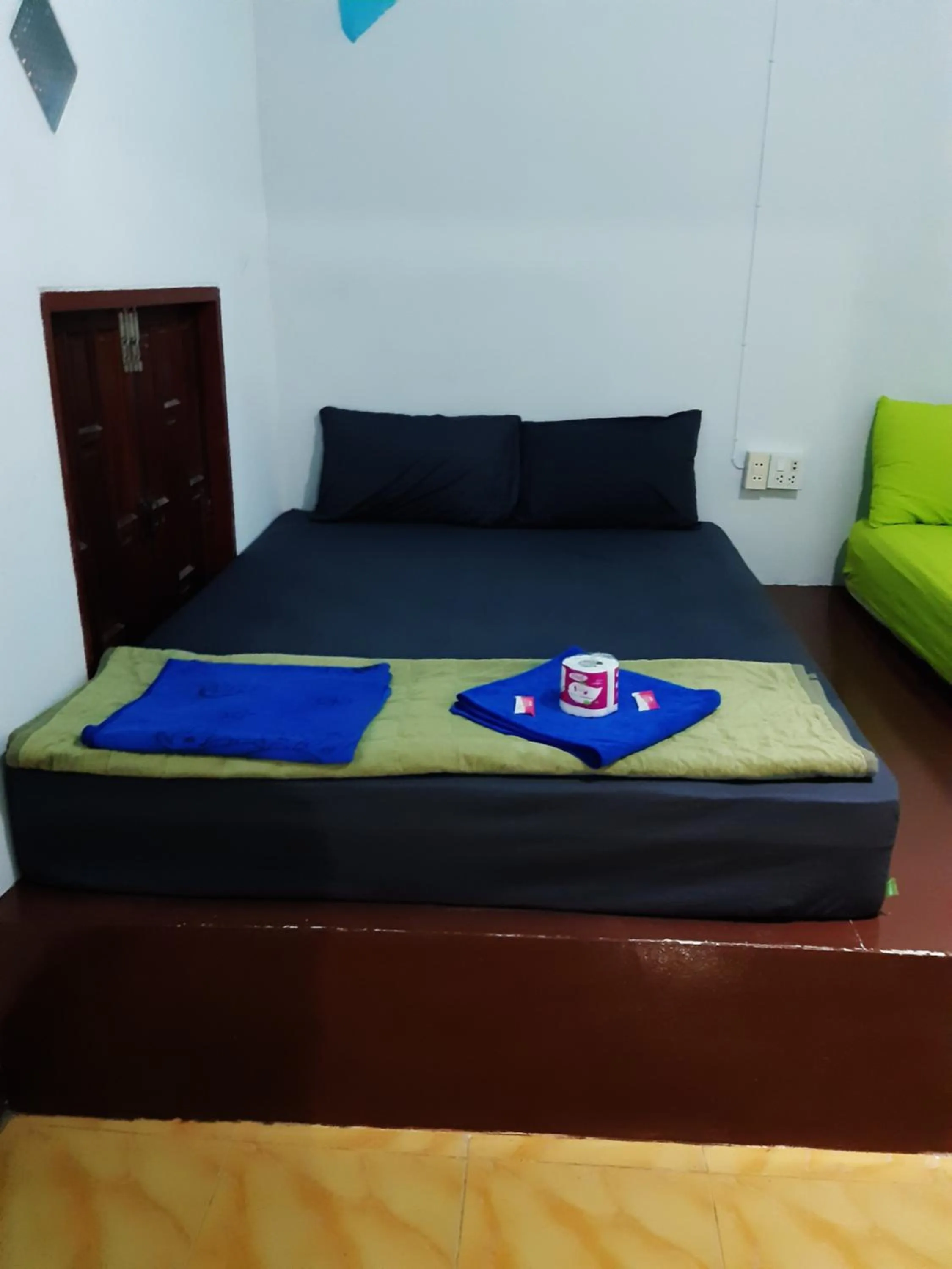 Photo of the whole room, Bed in Som PalmGarden