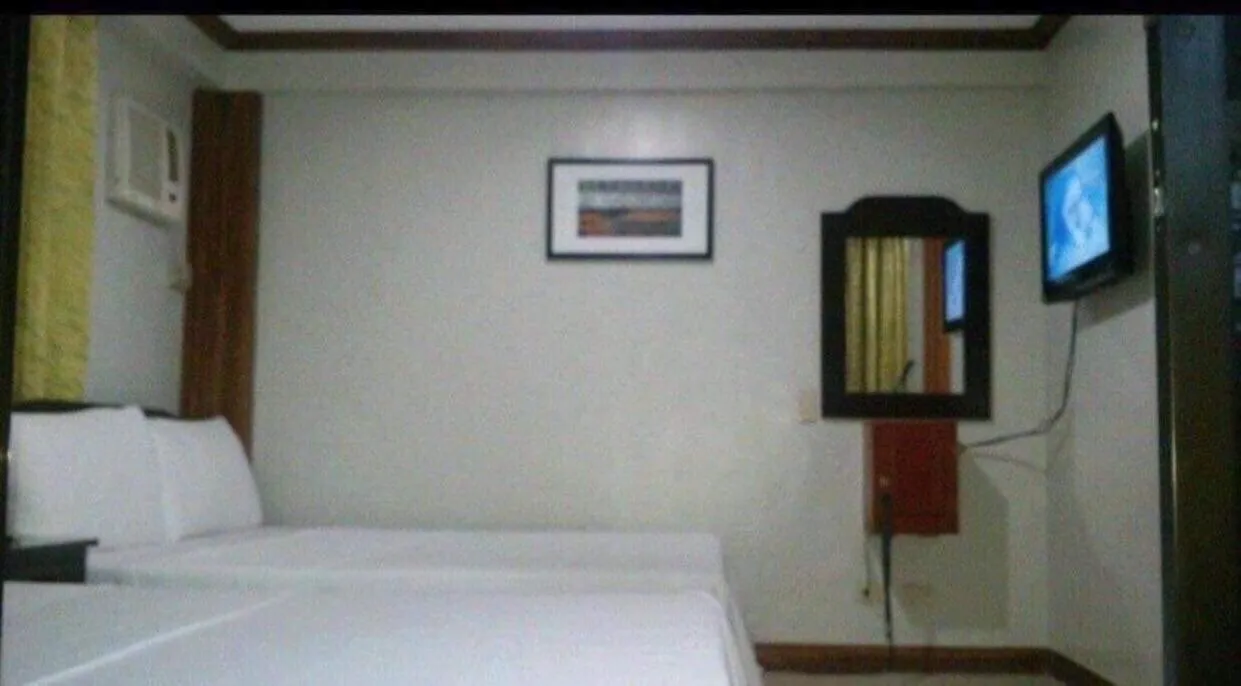 Bed in Double Diamond Inn Guest House