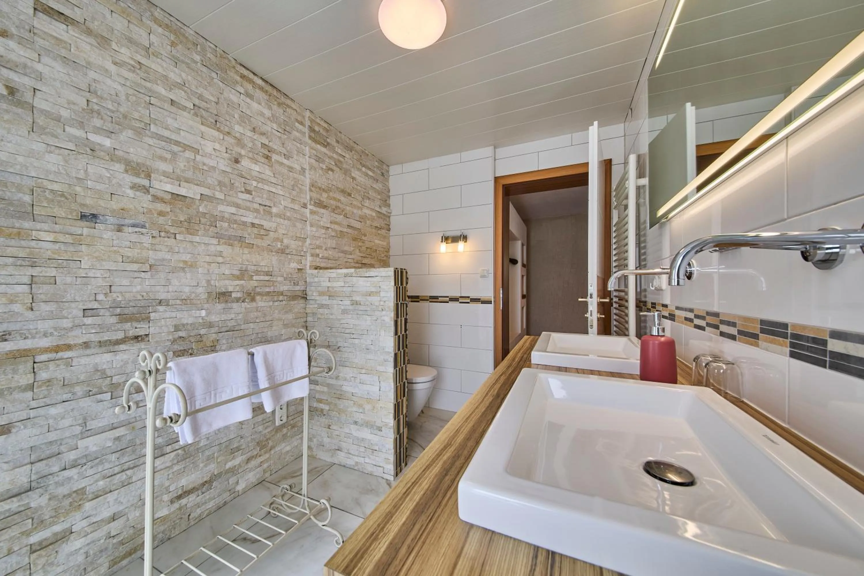 Bathroom in Apartments Enzian
