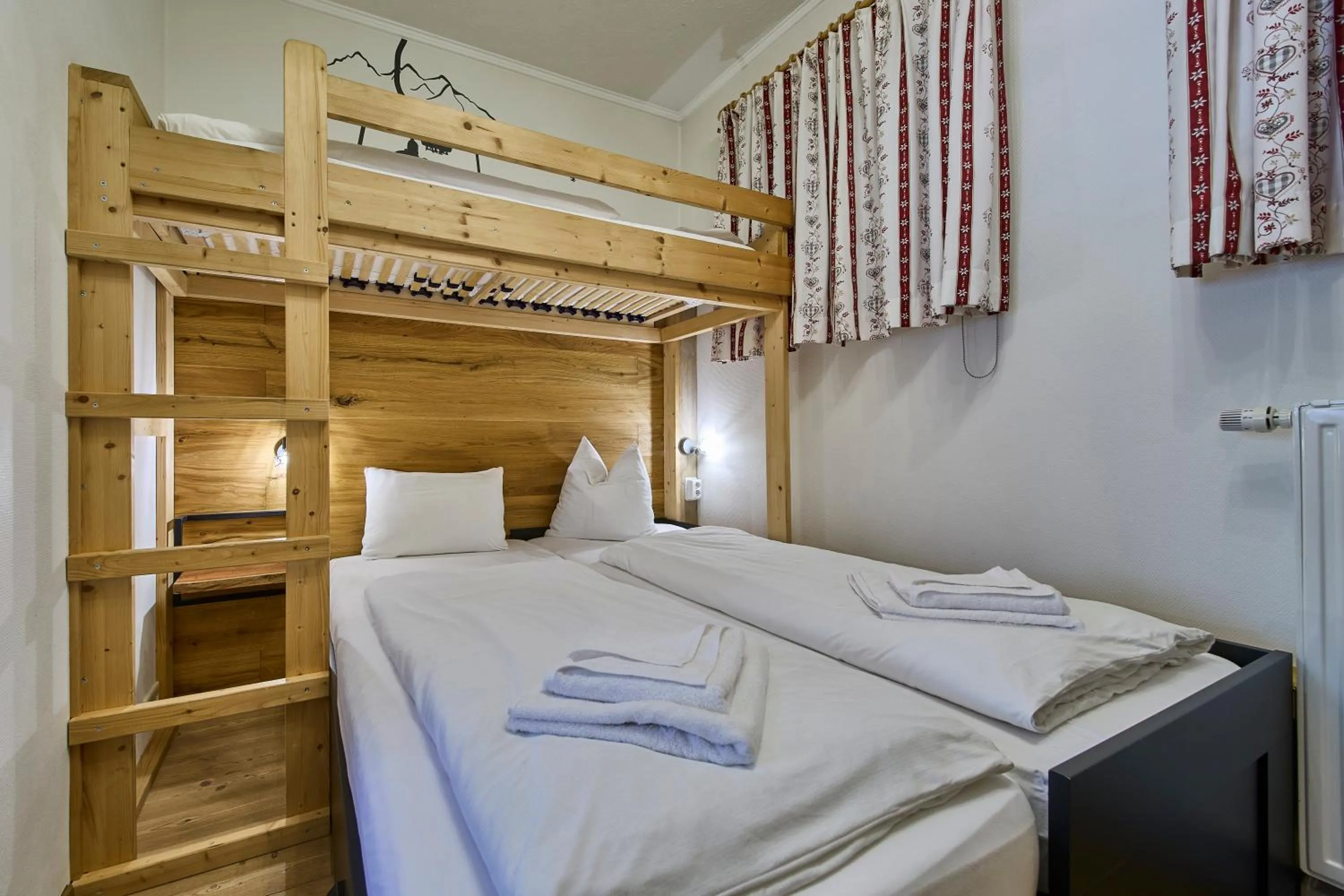 Bed in Apartments Enzian