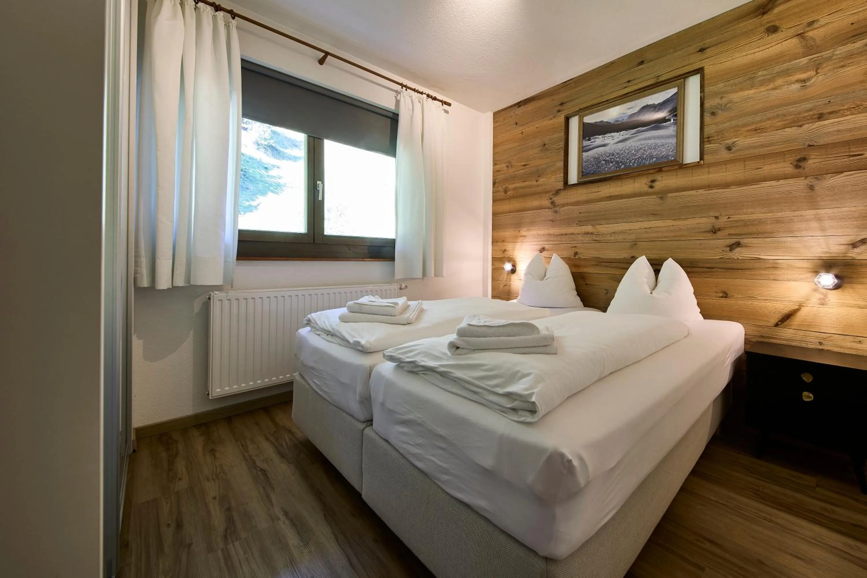 Bed in Apartments Enzian