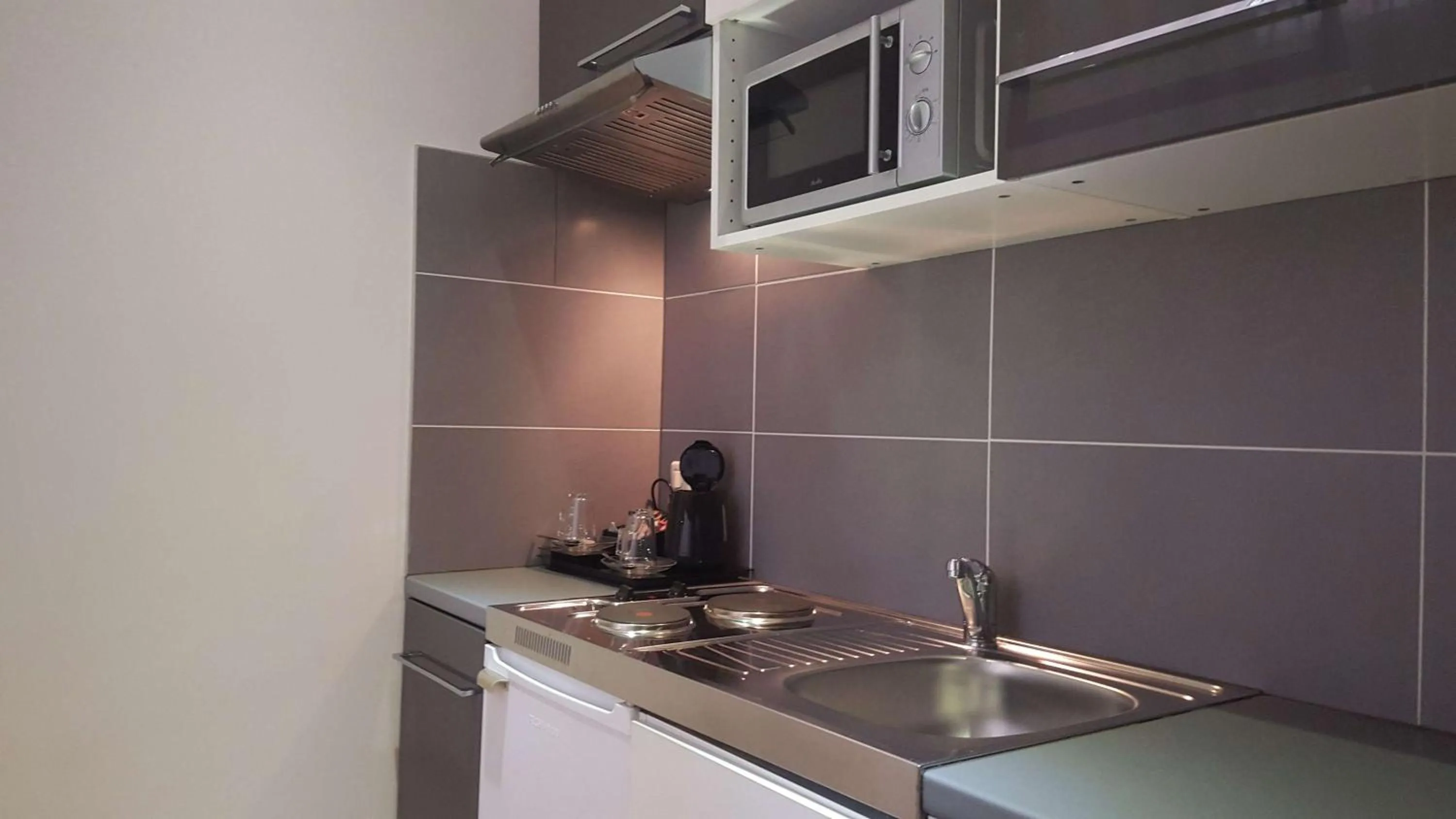 Kitchen or kitchenette in Best Western Plus Hotel Arcadia