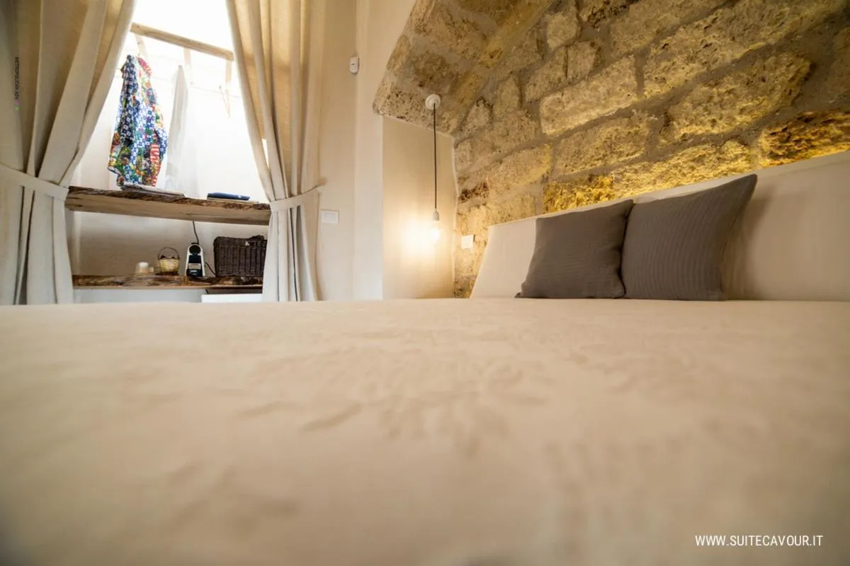 Bed in Suite Cavour B&B