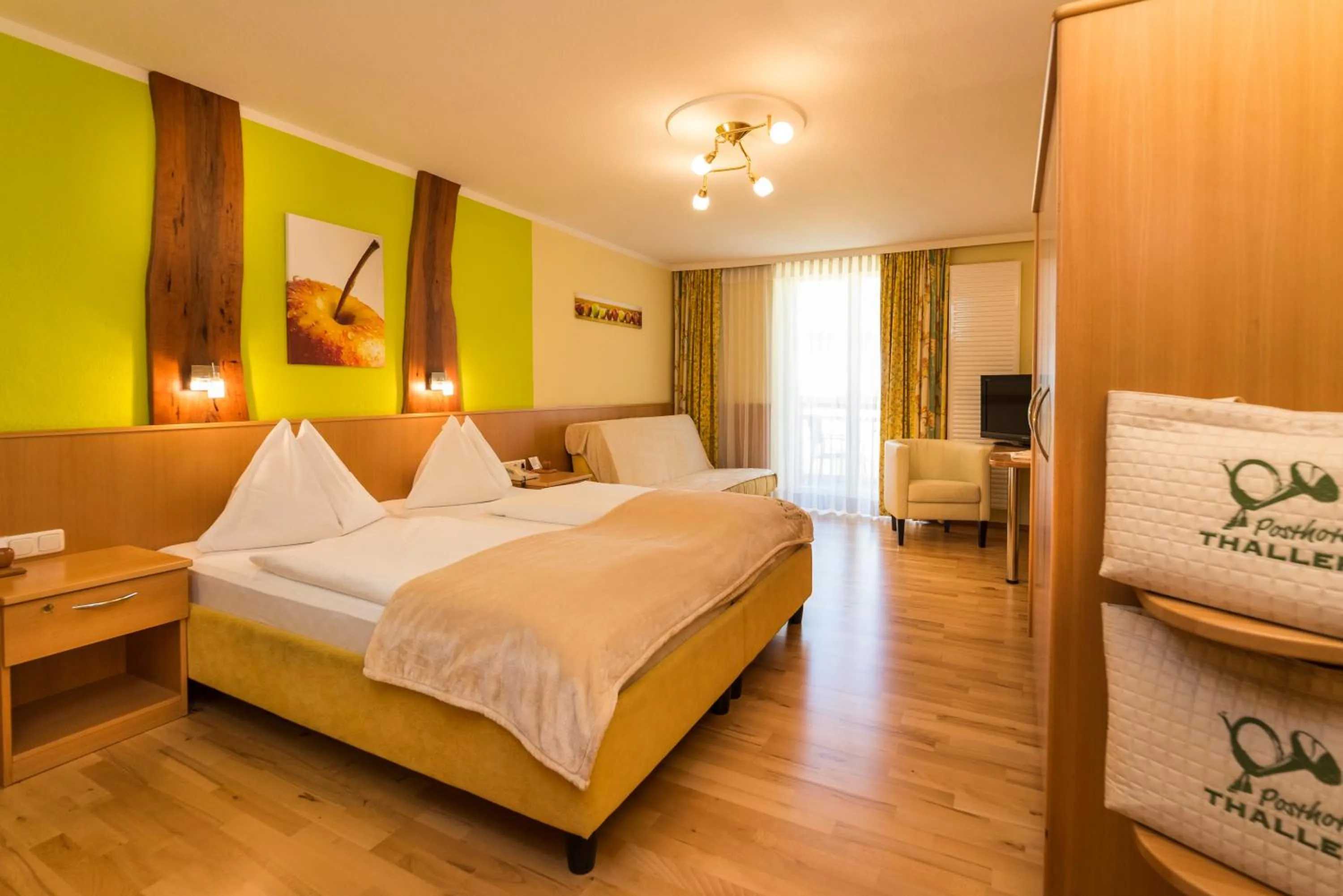 Photo of the whole room, Bed in Der Thaller - Wirtshaus - Restaurant - Hotel