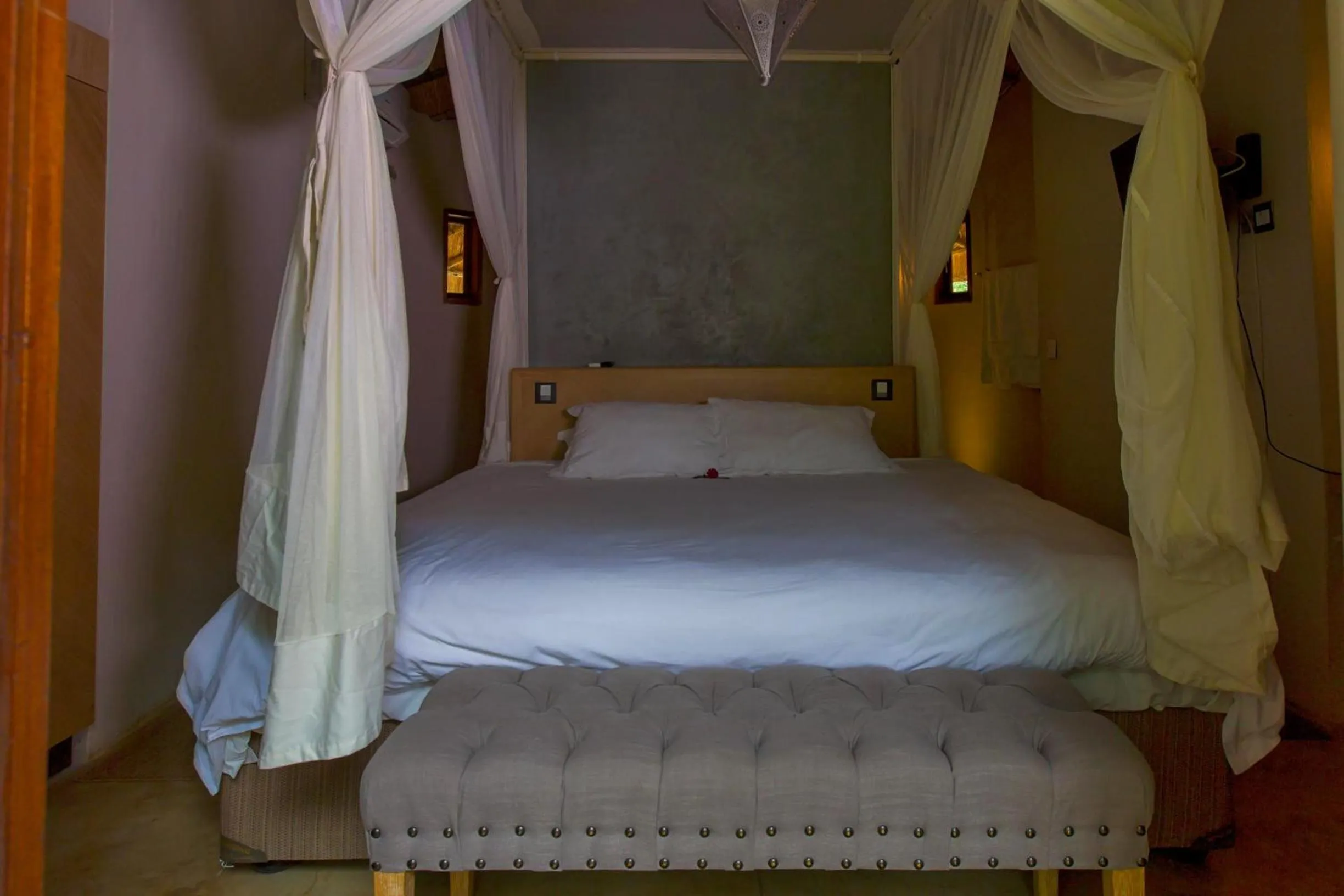 Bed in The Royal Sichango Village