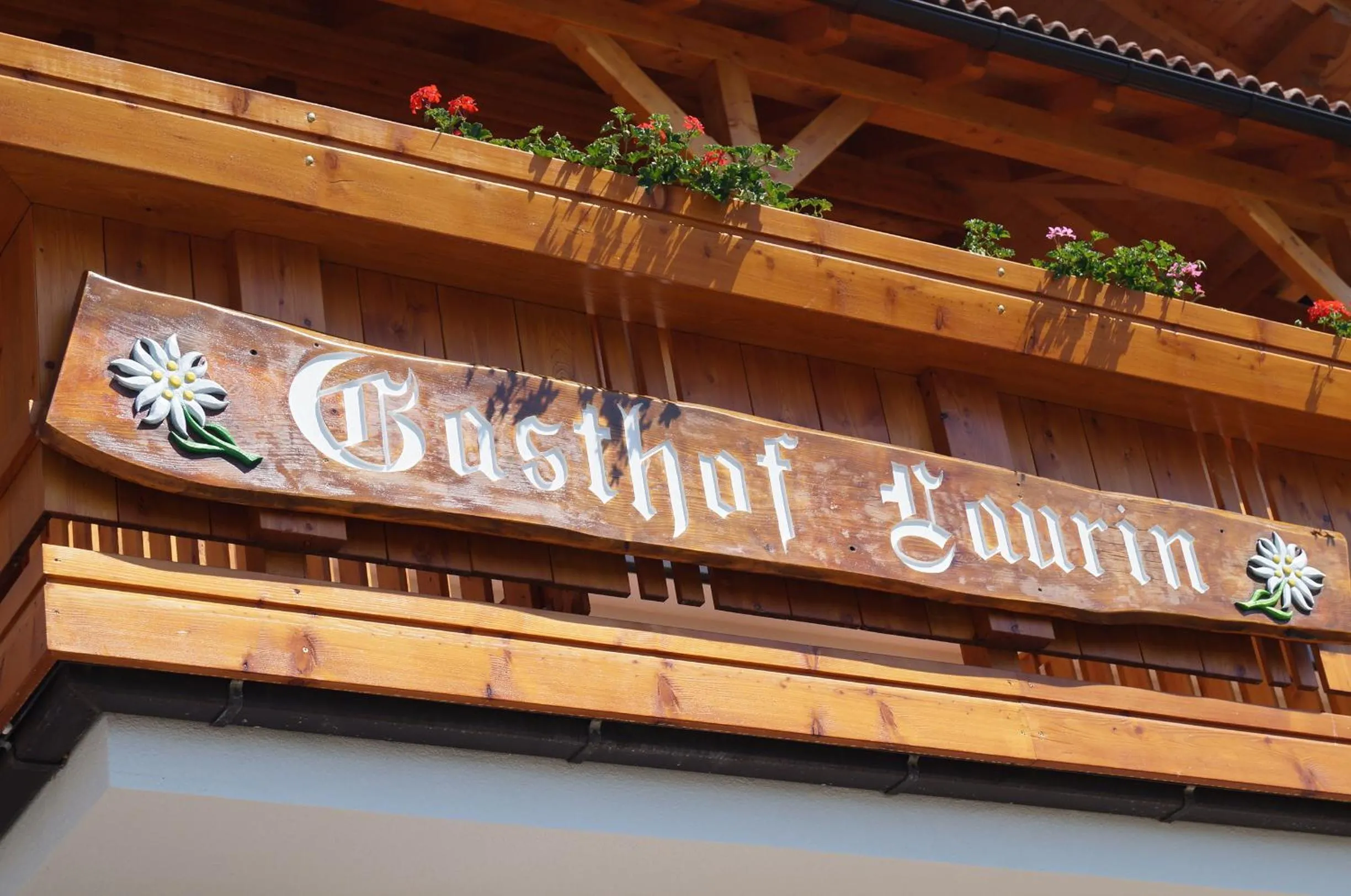 Property logo or sign in Hotel Laurin