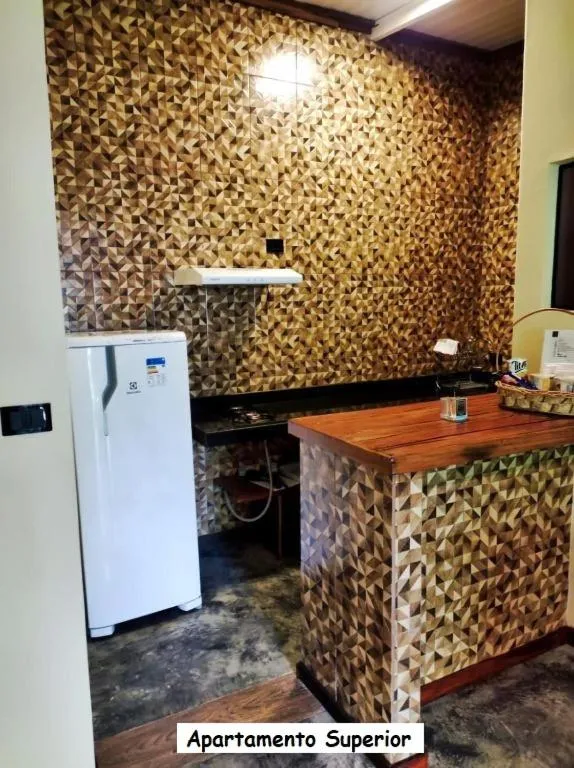 Kitchen or kitchenette in Sanctuary Pirenópolis Suítes e Flats
