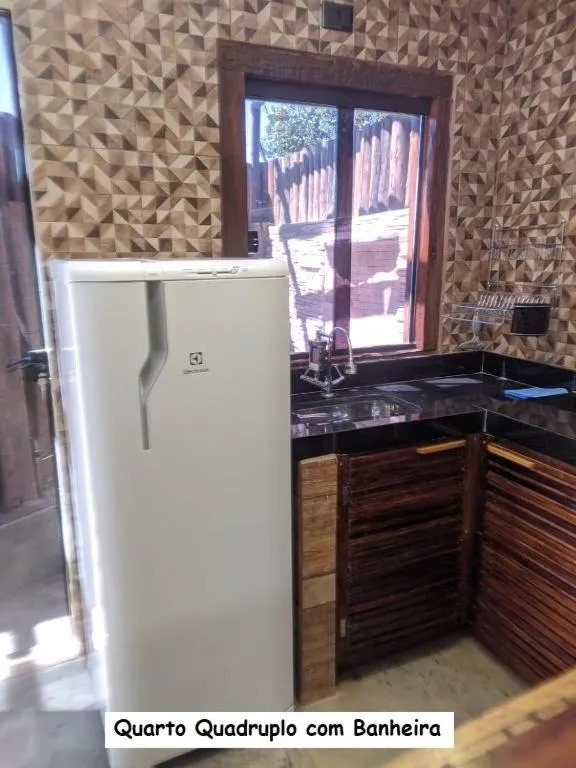 Kitchen or kitchenette in Sanctuary Pirenópolis Suítes e Flats
