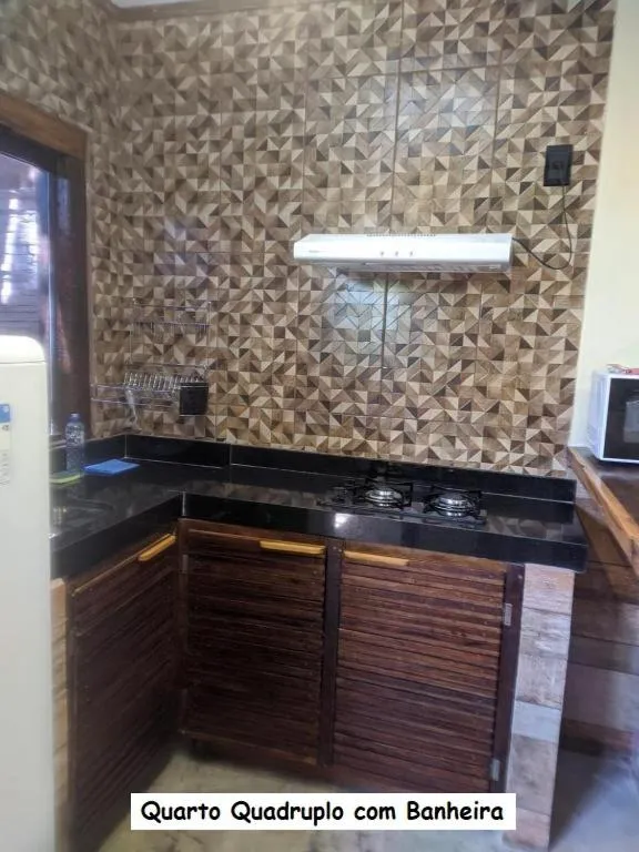 Kitchen or kitchenette in Sanctuary Pirenópolis Suítes e Flats